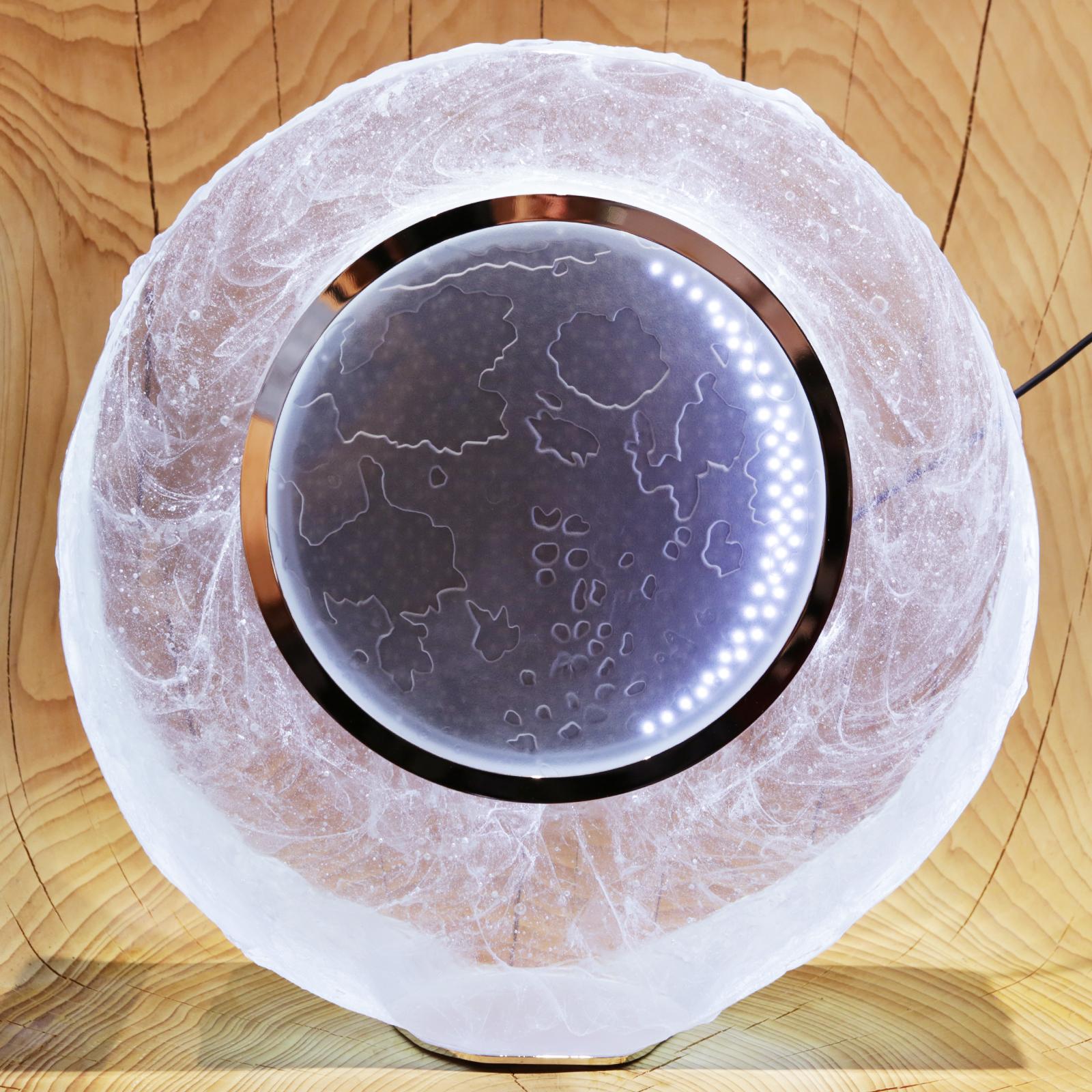 Lunar clock in pure crystal glass paste made in France in 2018.
Clock showing moon age, also shows moon sunsets and sunrises.
Major world cities are planned. Moon appears in crystal block filled
with a multitude of clouds and dotted with craters