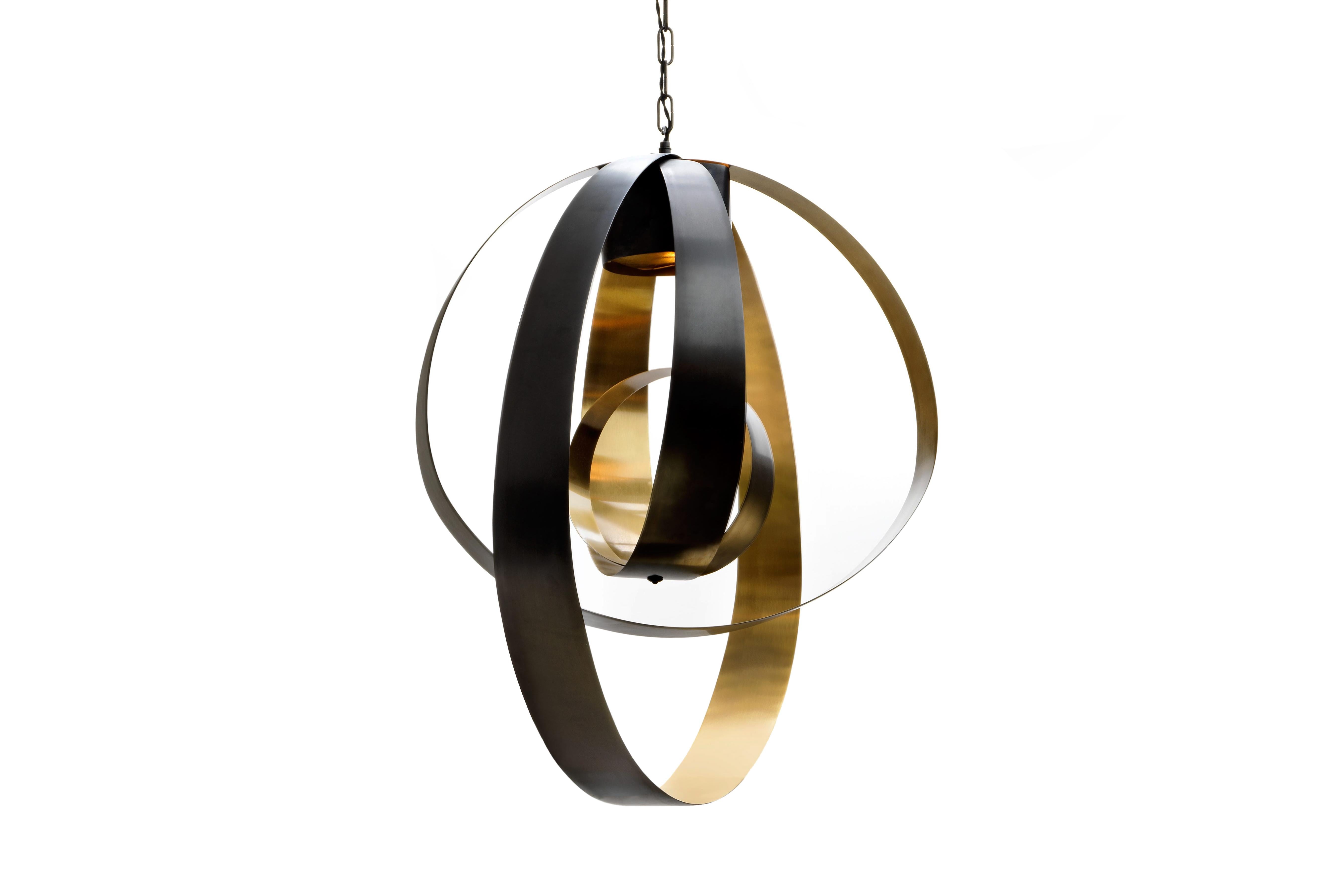 Lunar large pendant by CTO lighting
Materials: bronze with satin brass and bronze oval chain/black braided flex
Dimensions: H 80 x W 80 cm

All our lamps can be wired according to each country. If sold to the USA it will be wired for the USA for