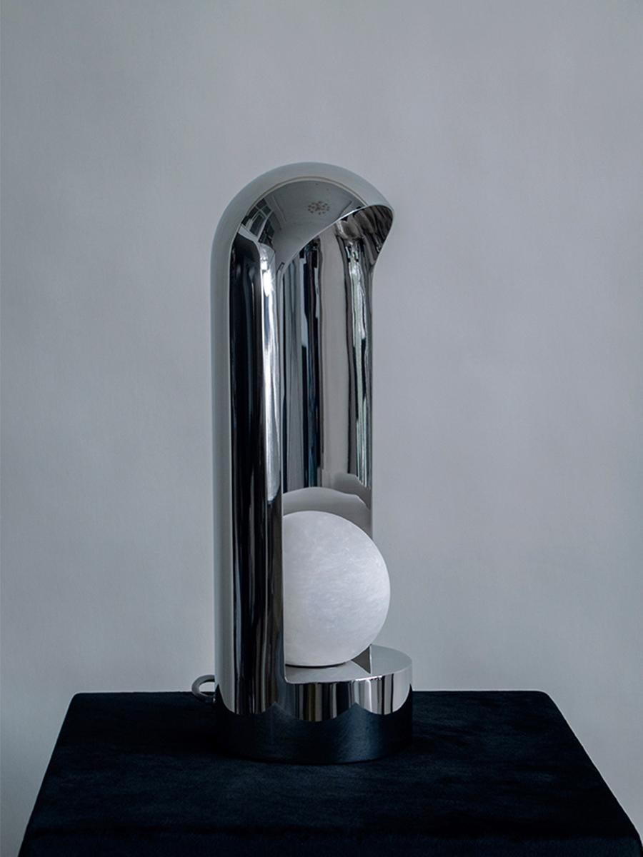 The lunar sanctuary table lamp is an ode to French architectural theorist Etienne-Louis Boullée's monument to Newton. A spiritual shrine that turns out was impossible to build. Shaw Liu finds inspiration in this unrealised architecture, particularly