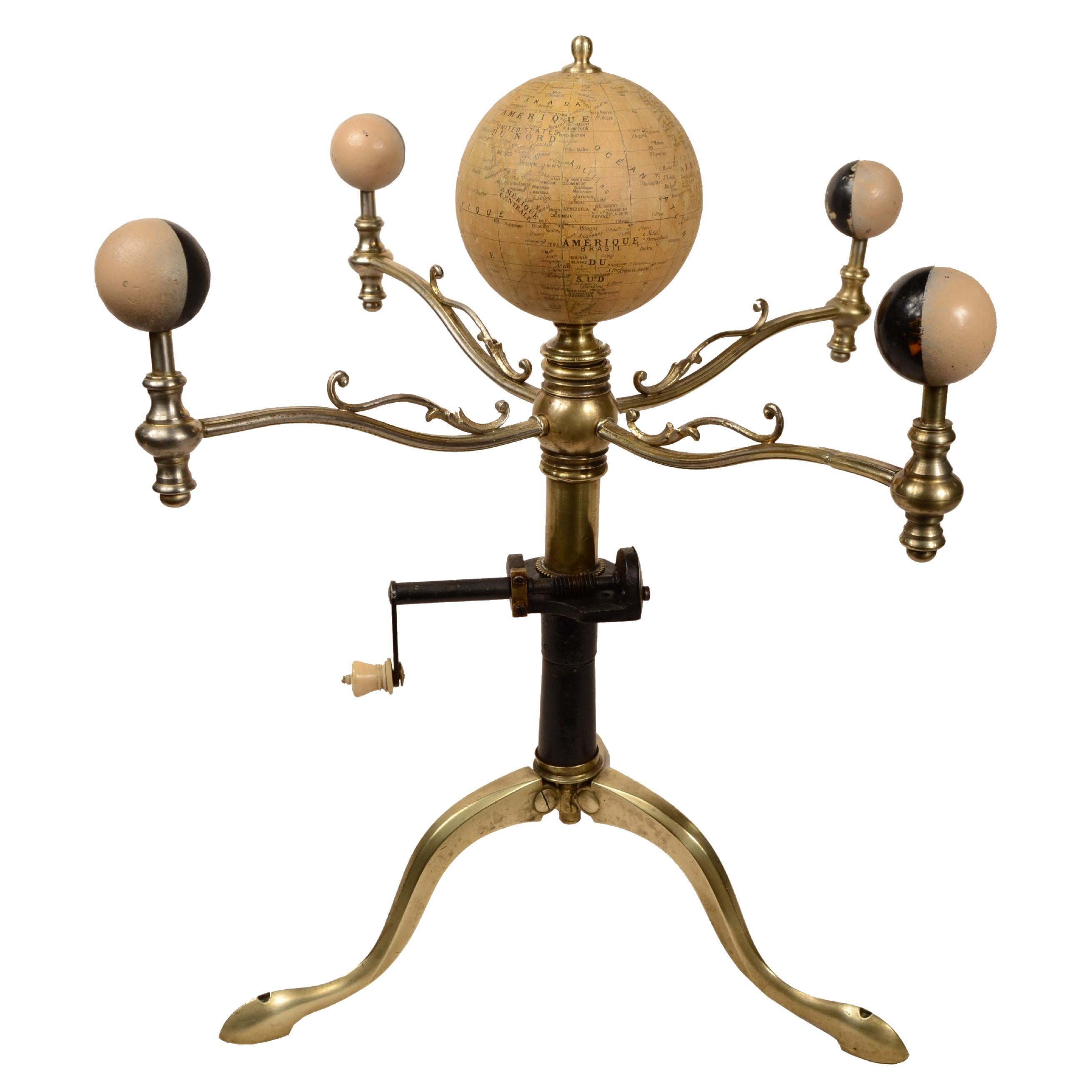Mechanical lunarium instrument that mechanically illustrates the various phases of the moon