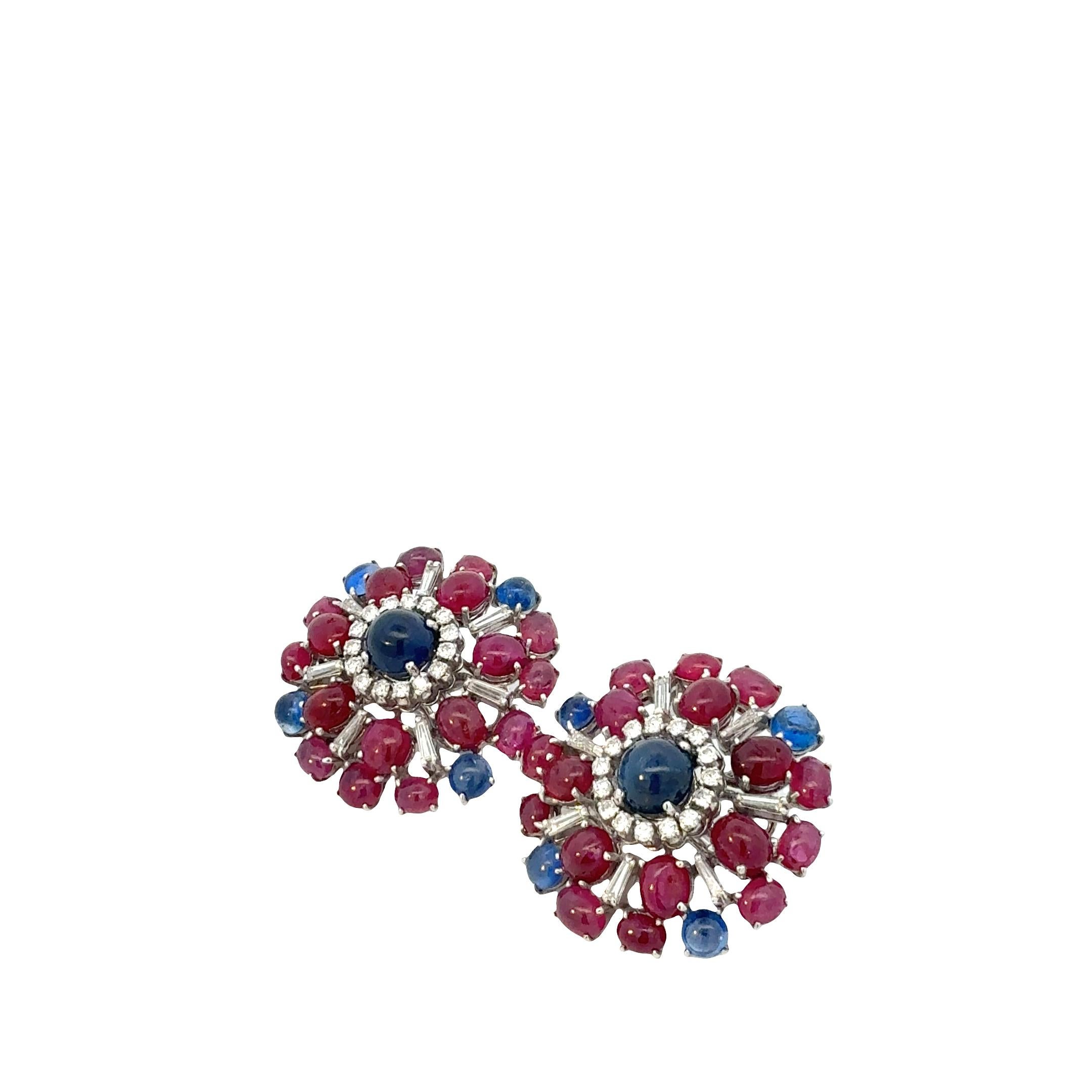 Lunati Vintage Sapphire, Ruby & Diamond Earrings, 1960s

A chic and joyful pair of 1960s earrings by the Italian jeweler Lunati, known for creating distinctive and beautifully crafted pieces.
Designed in 18k white gold, these round earrings feature