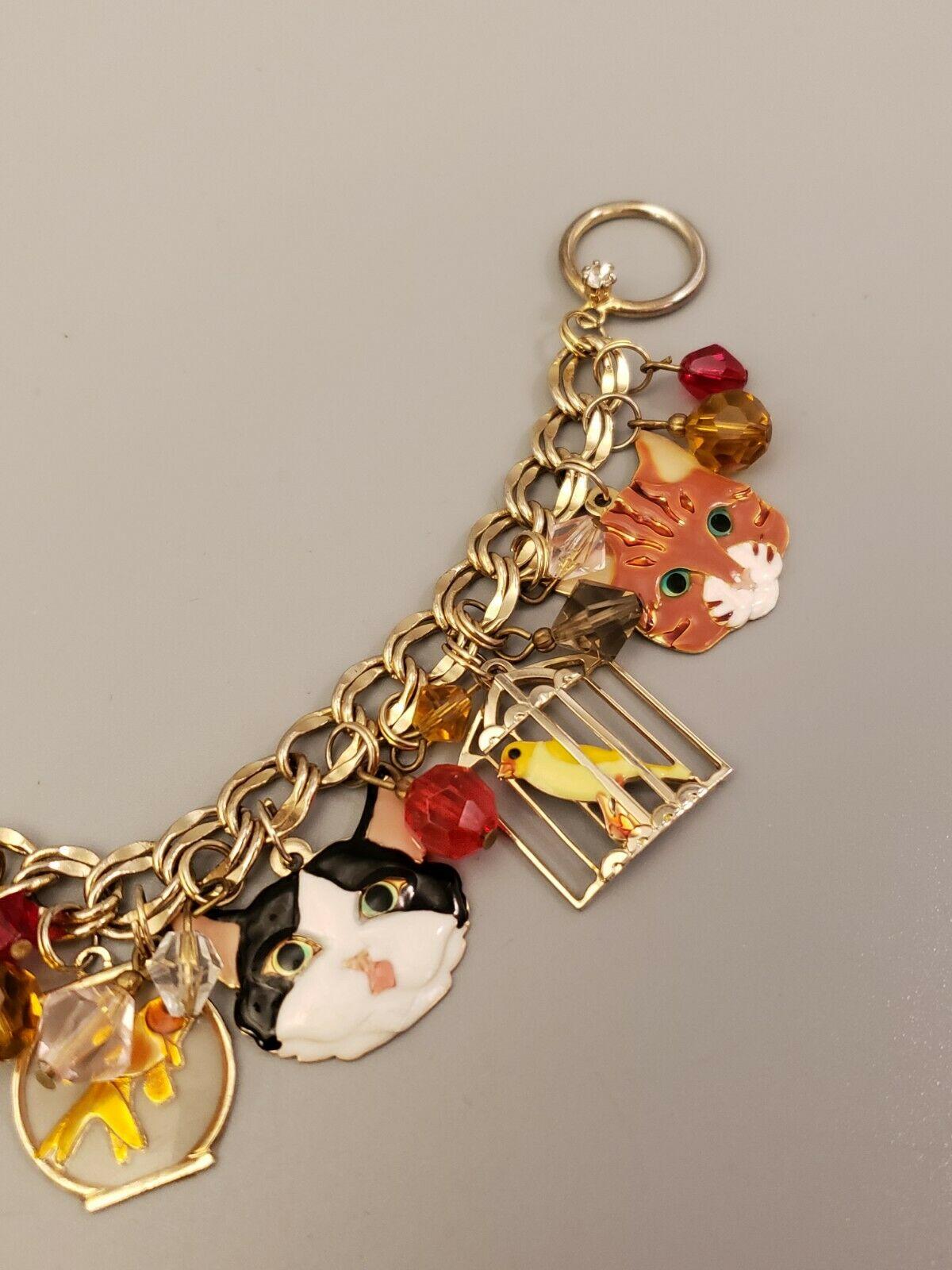 Contemporary Lunch at the Ritz Signed Multi Charm Cats Mouse and Bird in Gilt Cage Bracelet 