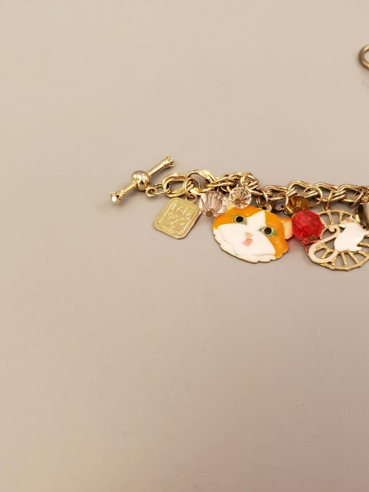 Women's Lunch at the Ritz Signed Multi Charm Cats Mouse and Bird in Gilt Cage Bracelet 