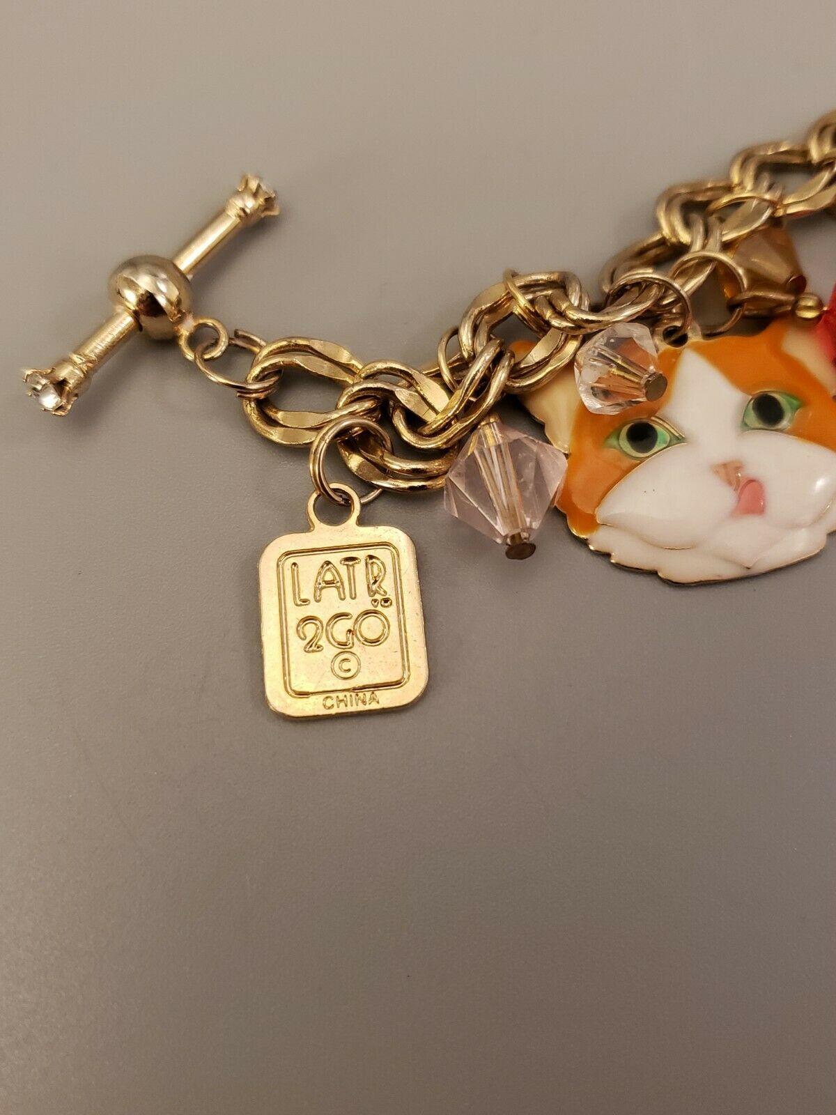 Lunch at the Ritz Signed Multi Charm Cats Mouse and Bird in Gilt Cage Bracelet  2