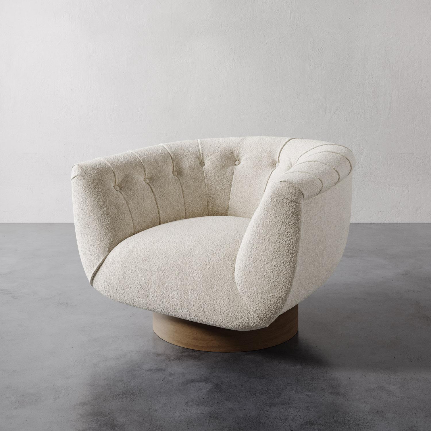 The Lune swivel chair from Lemieux et Cie is a masterful expression of sculptural comfort, its perfectly rounded form embracing the body with the same enveloping ease as the great Danish Modern chairs of the 1940s and ’50s. Evoking the legacy of