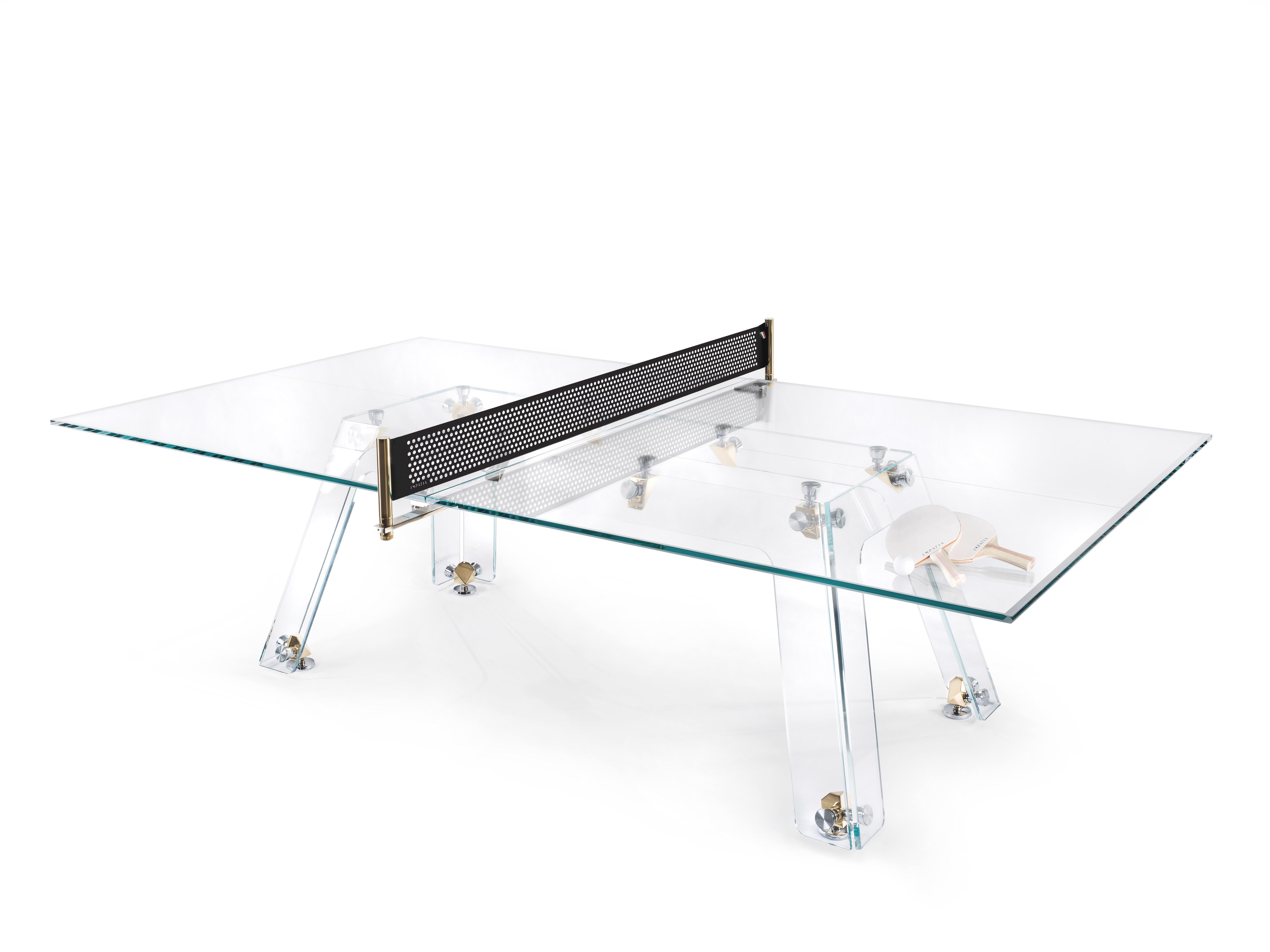 Lungolinea gold table tennis by Impatia
Dimensions: D 274 x W 152.5 x H 76 cm
Weight: 220 kg
Material: low-iron glass, polished metal components, 24k gold plated connecting joints.
Also available: different colors and materials.

The idea of