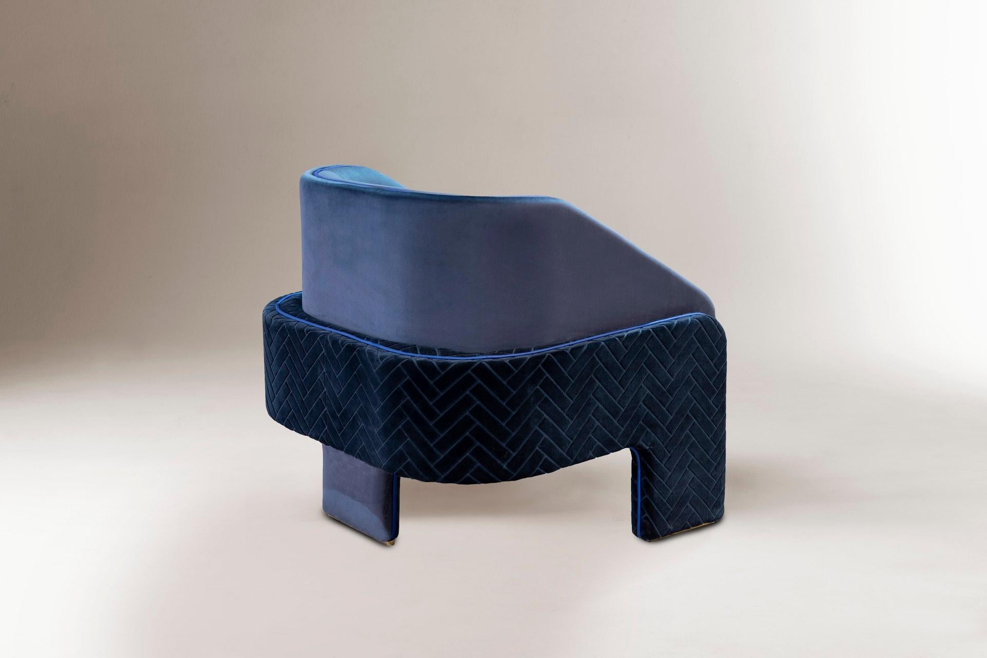Der Sessel L'Unité ist proportional und skulptural, perfekt auf den menschlichen Maßstab abgestimmt. Es versammelt starke, gepolsterte Formen, die leicht auf eleganten Ständern ruhen. Ein Werk, das das Auge und die Fantasie anregt, inspiriert vom