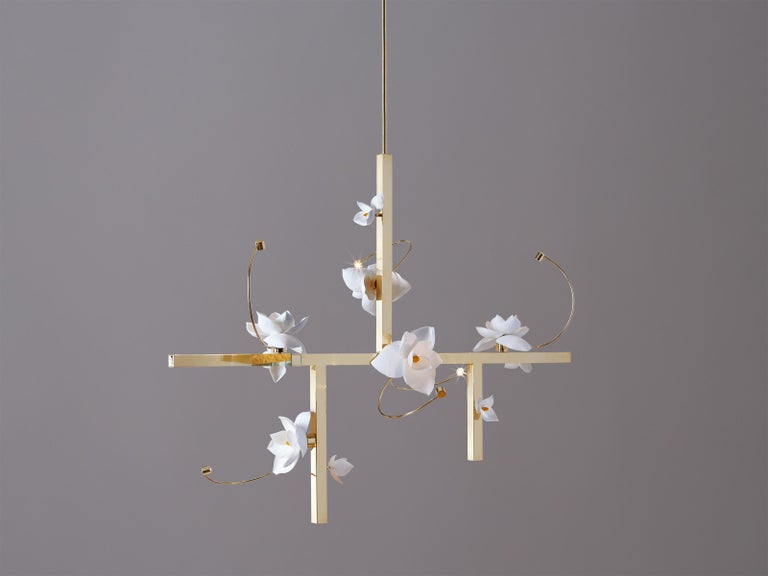 Each blossom, a unique, delicate arrangement. At once open and closed, the flower’s light and shadow lure one into its contemplative depths.

Lure transforms a flower’s transient beauty into a lasting light. In this fixture, a cast cotton paper