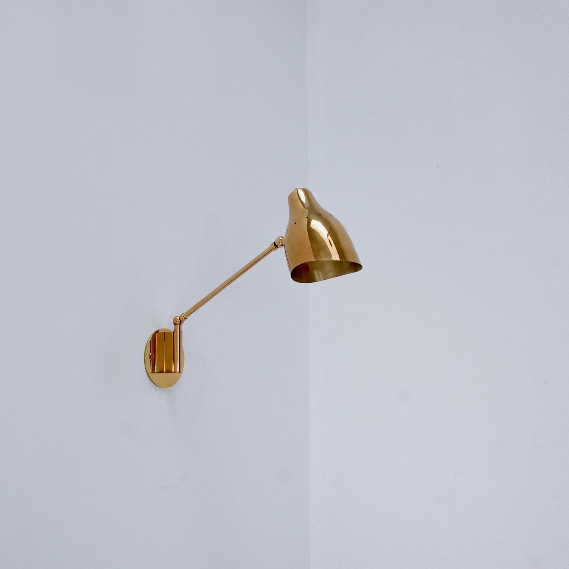 A foldable and swing version of our original LU read sconce with a foldable and swingable articulated arm to allow for more variance in light direction. Made in solid brass including shade. Lightly aged brass finish. Custom dimensions available upon