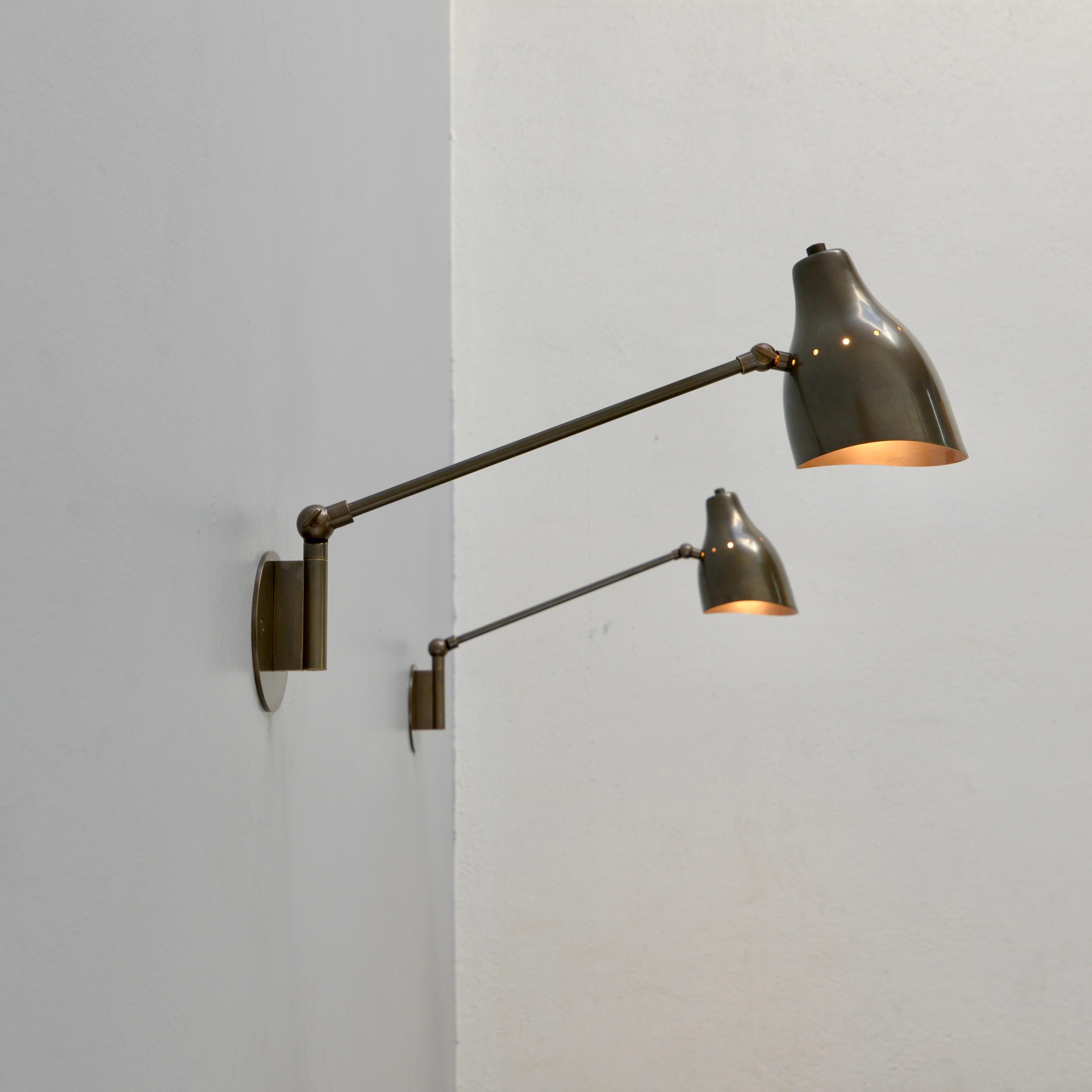 A foldable and swing version of our original LU read sconce with a foldable and swingable articulated arm to allow for more variance in light direction. Made in solid brass including shade. Dark antique brass finish. Custom dimensions available upon