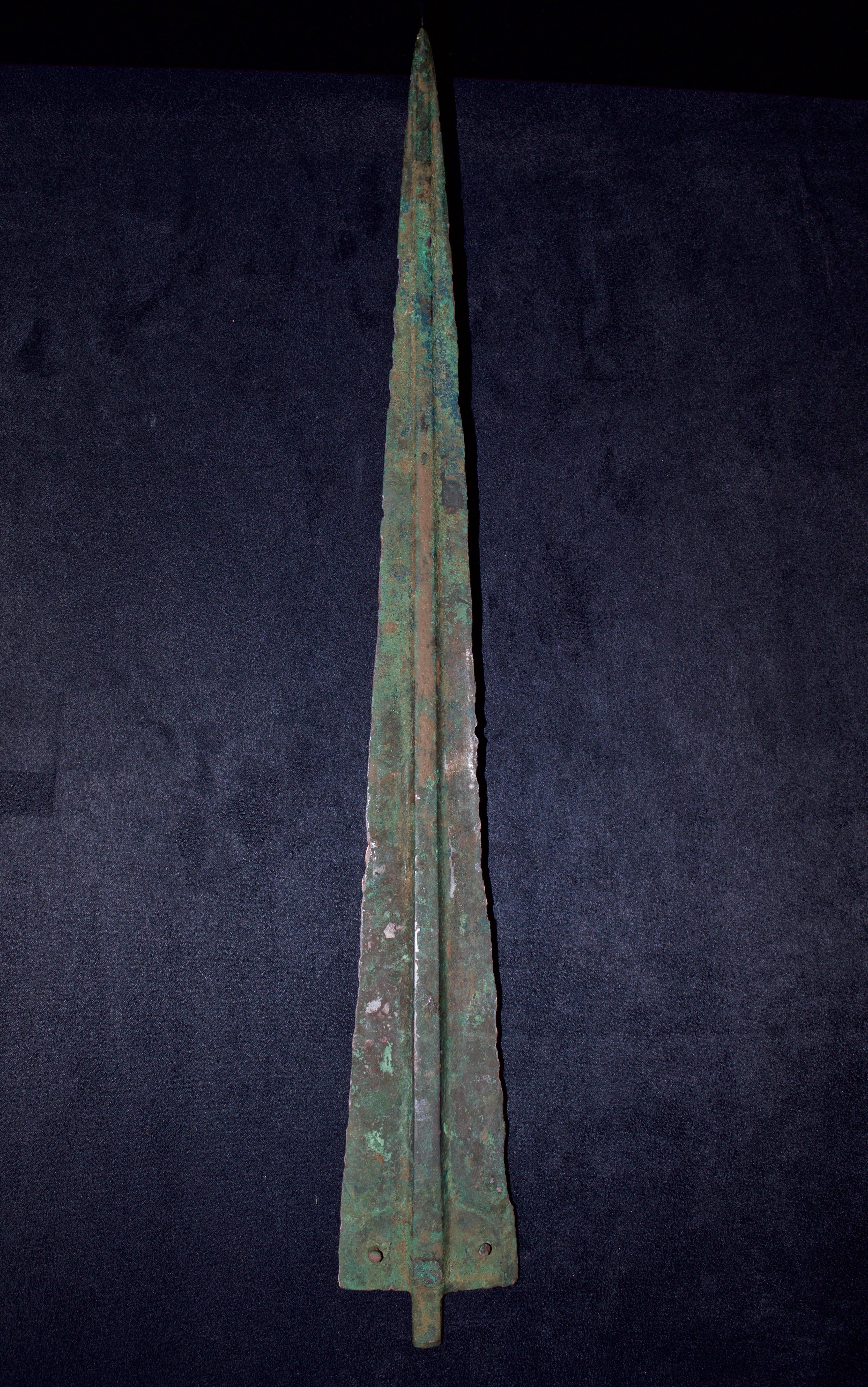 A long tapered insertion tang. It features blue-green and russet surface patinas, minor edge roughness, otherwise intact. This piece comes with a custom stand and Certificate of Authenticity included.

Luristan (or Lorestan) is a province of western