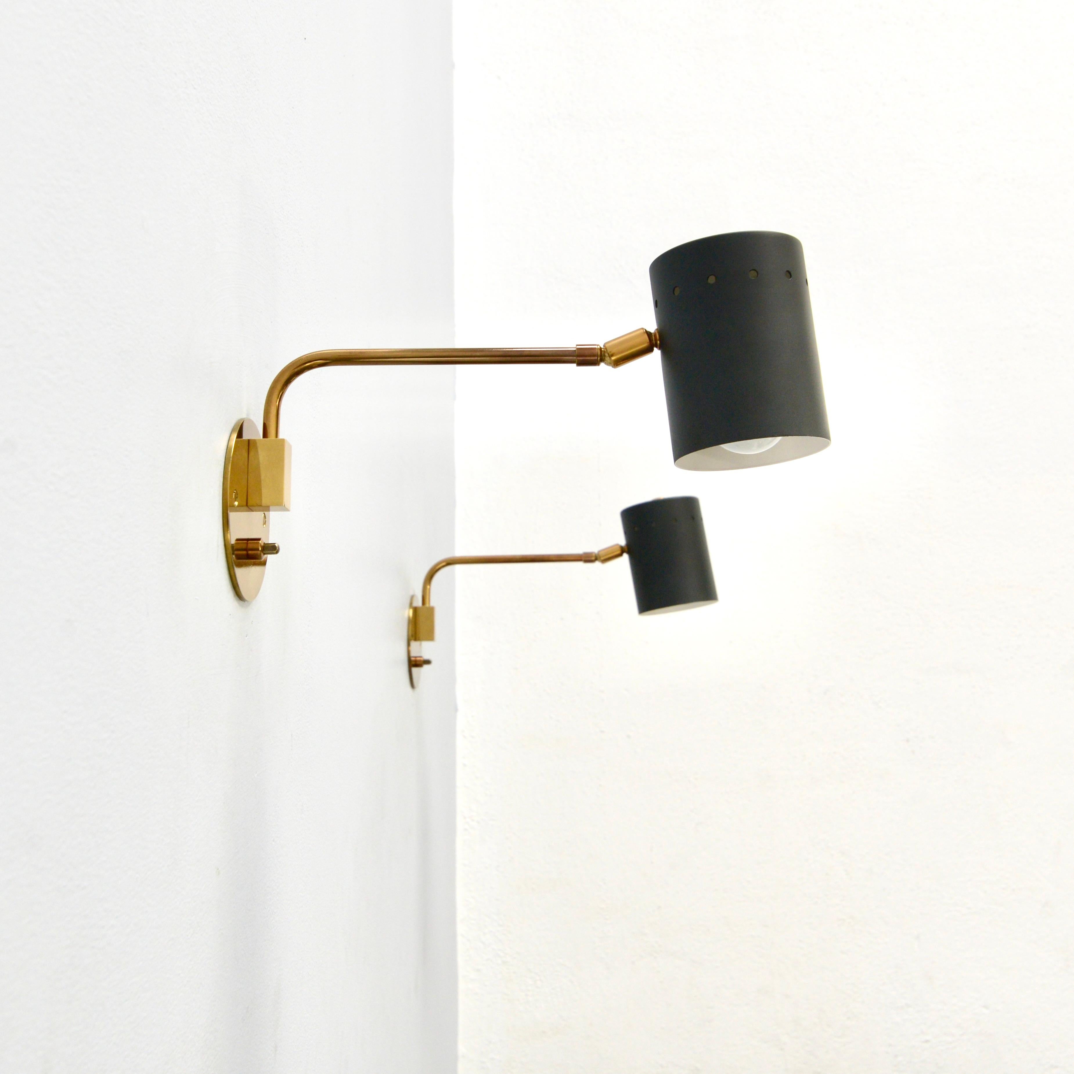 The versatile and elegant LURL Sconce by Lumfardo Luminaires is a mid-century Italian inspired wall sconce in lightly aged brass and painted aluminum. This sconce is made in the USA and is part of our contemporary collection. Often used for reading