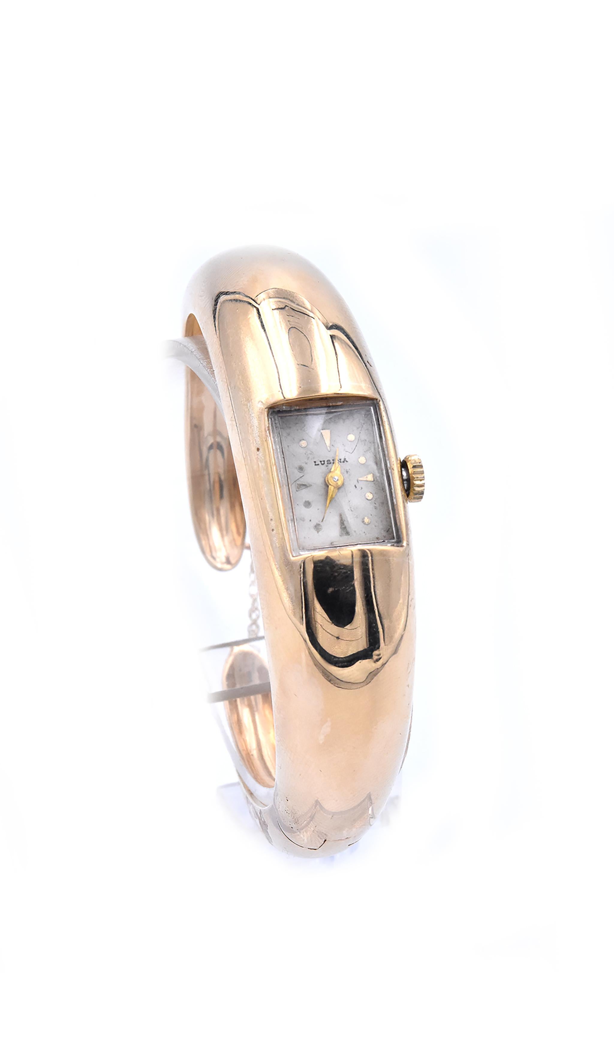 Movement: manual
Function: hours, minutes
Dial: white dot dial
17 Jewels
Measurement: cuff will fit a 6-inch wrist
Weight: 35.53 grams with movement

No original box and no paperwork.
Guaranteed to be authentic by seller.
