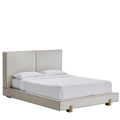 LUSO bed with upholstered headboard and base and Antique Brass color feet