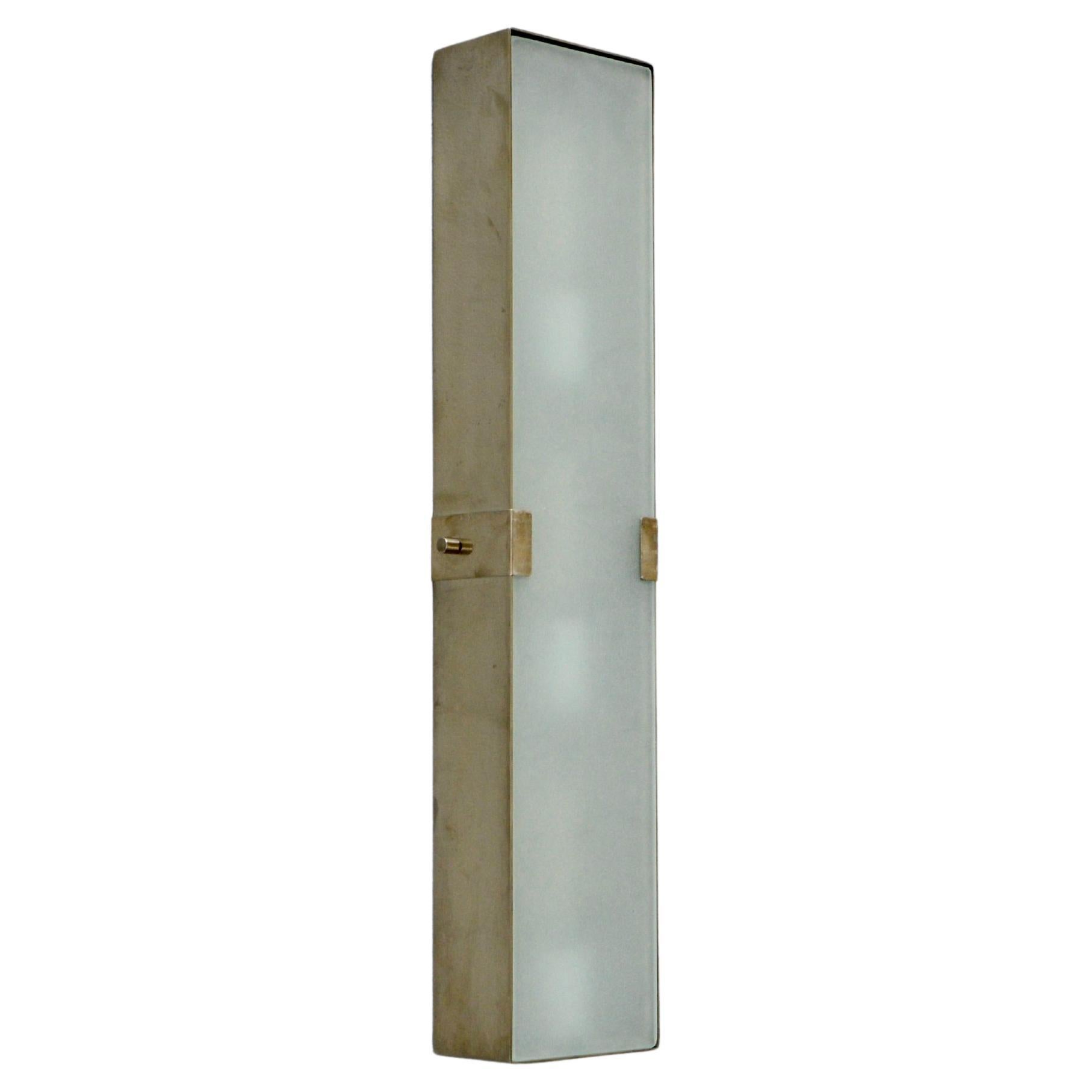 Part of Lumfardo Luminaries contemporary collection, the LUsquare RT Sconce PB is a narrower and longer expression of our LUsquare Sconce. Classic Mid-Century Modern design made to order. Crafted from patinated steel, patinated brass or aged silver