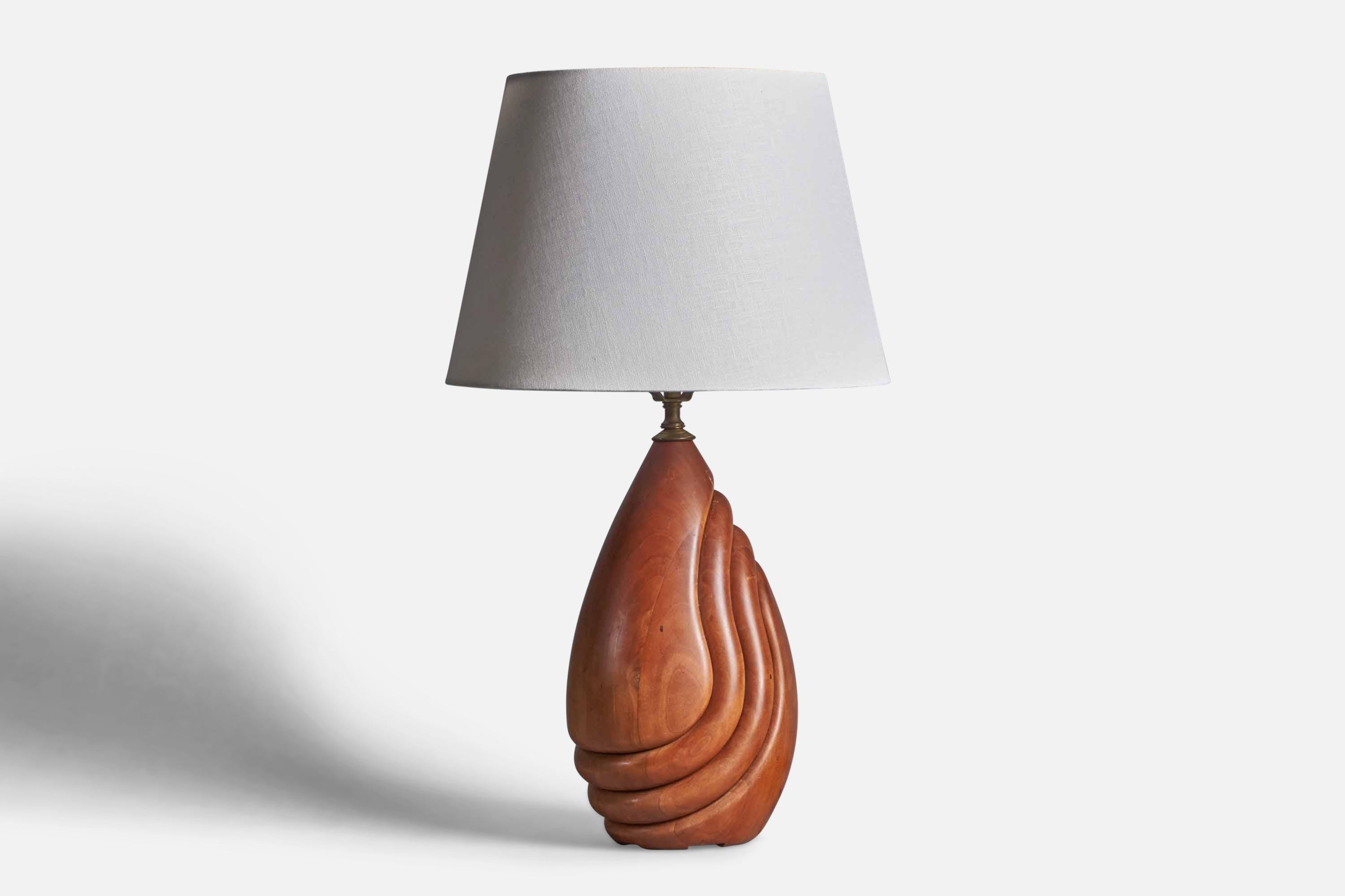 A freeform cherry and brass table lamp designed and produced by Lustig, US, 1980s.

Dimensions of Lamp (inches): 17” H x 7.5” Diameter
Dimensions of Shade (inches): 10