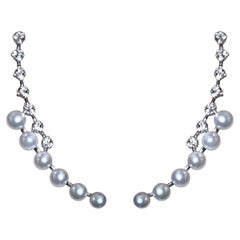 Orecchini a polsino con diamanti e perle Aurora Baby Akoya curvate