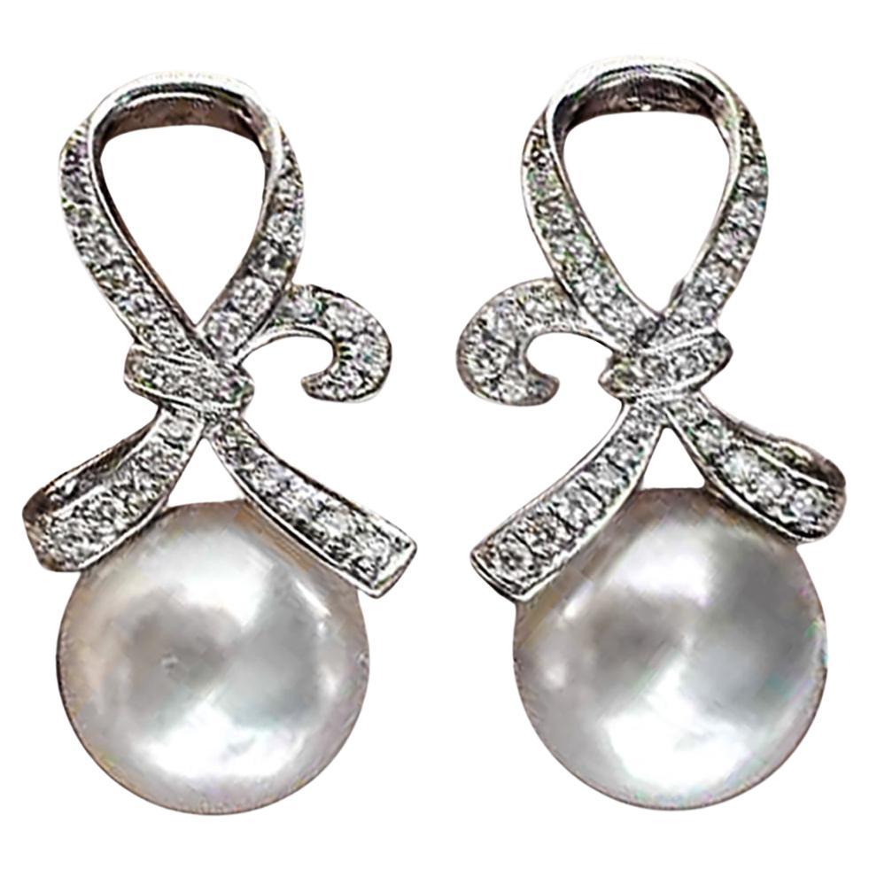 【Lustre Arc】Graceful Knot Aurora Südseeperlen-Ohrringe im Angebot