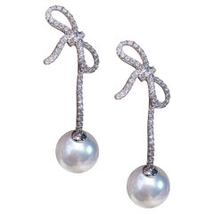 Orecchini a goccia con perle Aurora Akoya e diamanti con arco sottile