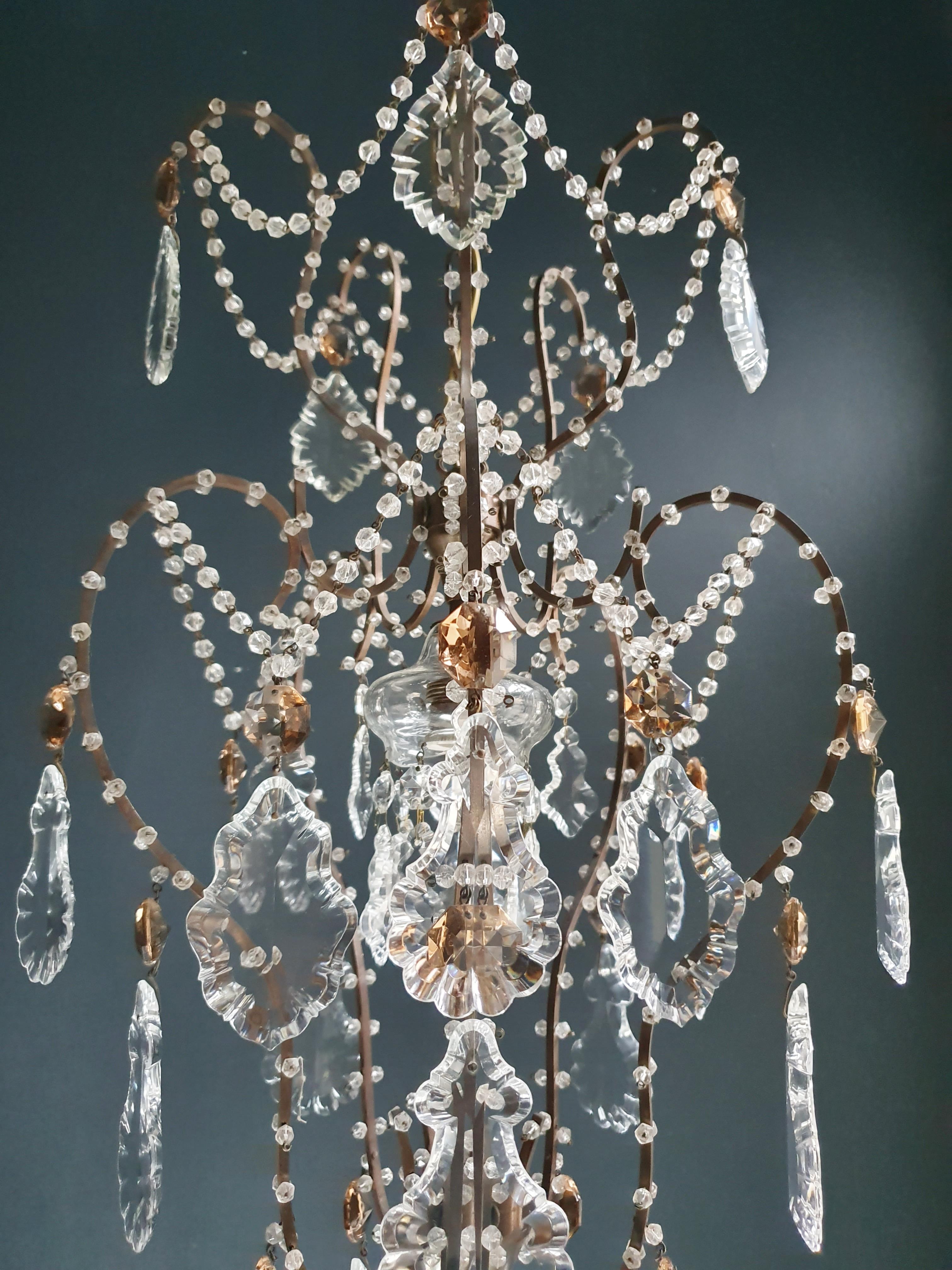Original preserved chandelier, circa 1940. Cabling and sockets completely renewed. Crystal hand knotted
Measures: Total height 99 cm, height without chain 75 cm, diameter 37 cm, weight (approximately) 2 kg.

Number of lights: One-light bulb