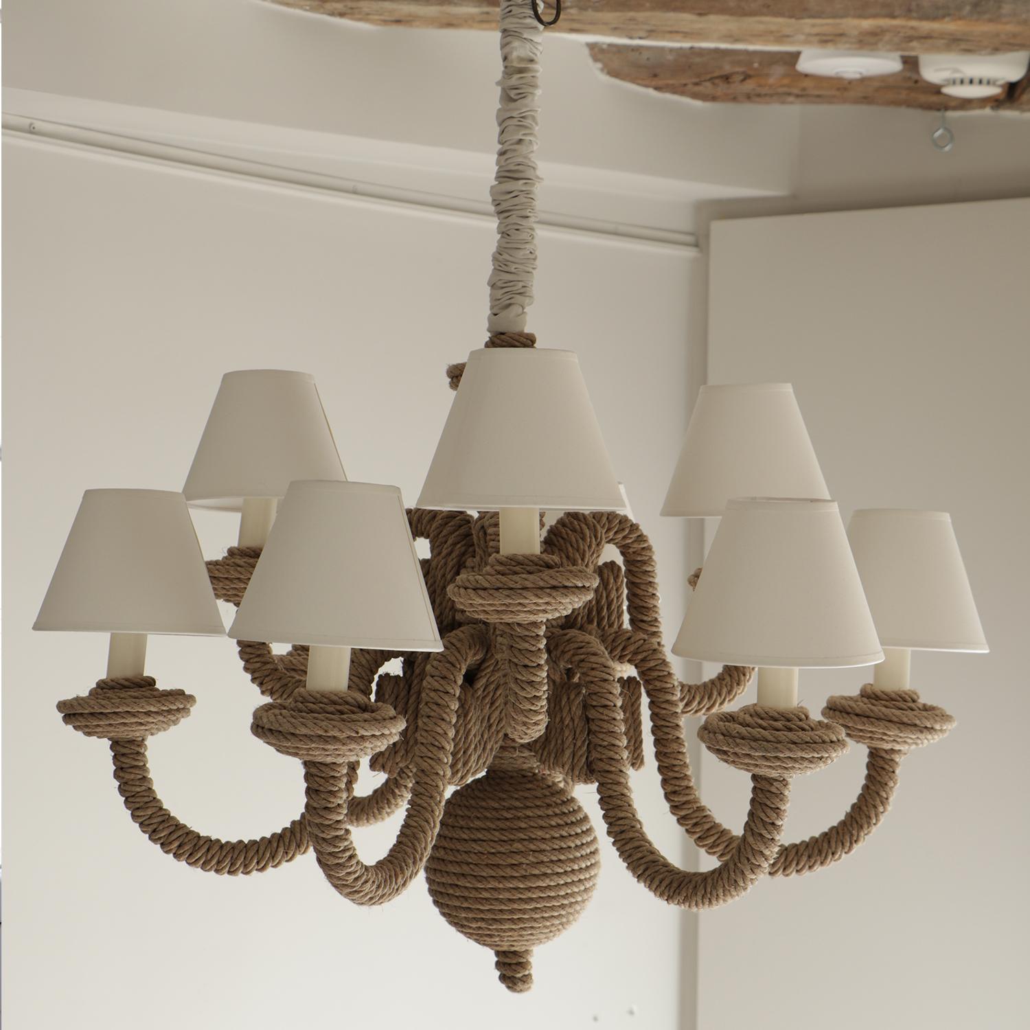 This nine-branched chandelier by Christian Astuguevieille is made of hemp rope covering a bronze structure. It is a unique model.

Christian Astuguevieille is a versatile artist, designer and creator. He experiments with textures, shapes and lines.