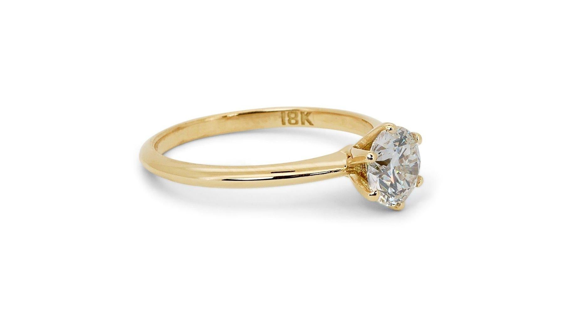 Lustrous 1.07ct Diamond Solitaire Ring in 18k Yellow Gold - GIA Certified

Embrace timeless elegance with this stunning 18k yellow gold diamond solitaire ring, featuring a 1.07-carat round diamond. Ideal for any occasion, this ring encapsulates