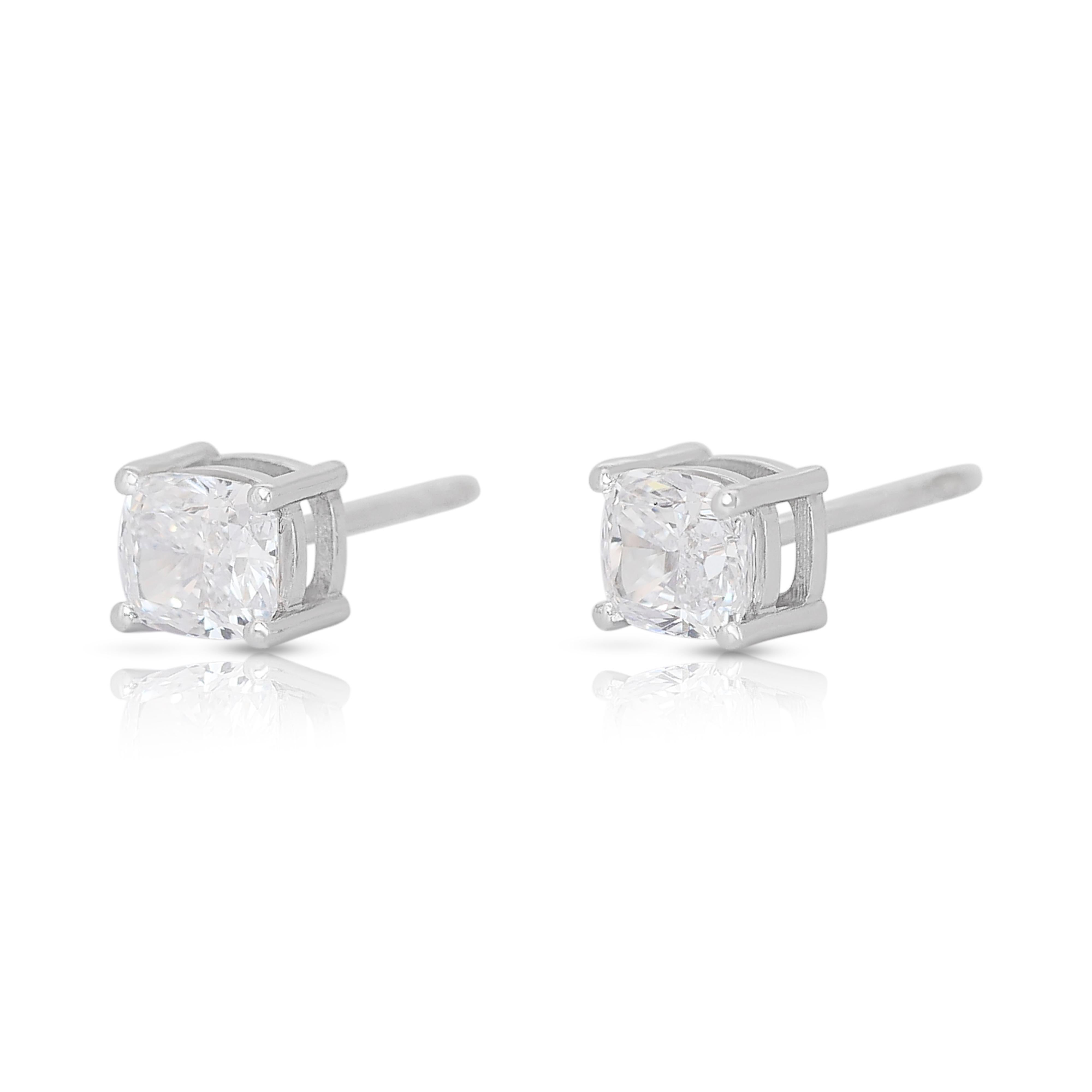 Lustrous 1.60ct Diamonds Stud Earrings in 18k White Gold - GIA Certified

Indulge in the pinnacle of luxury with these breathtaking diamond earrings, crafted in lustrous 18k white gold. Each earring features a stunning cushion-cut diamond weighing