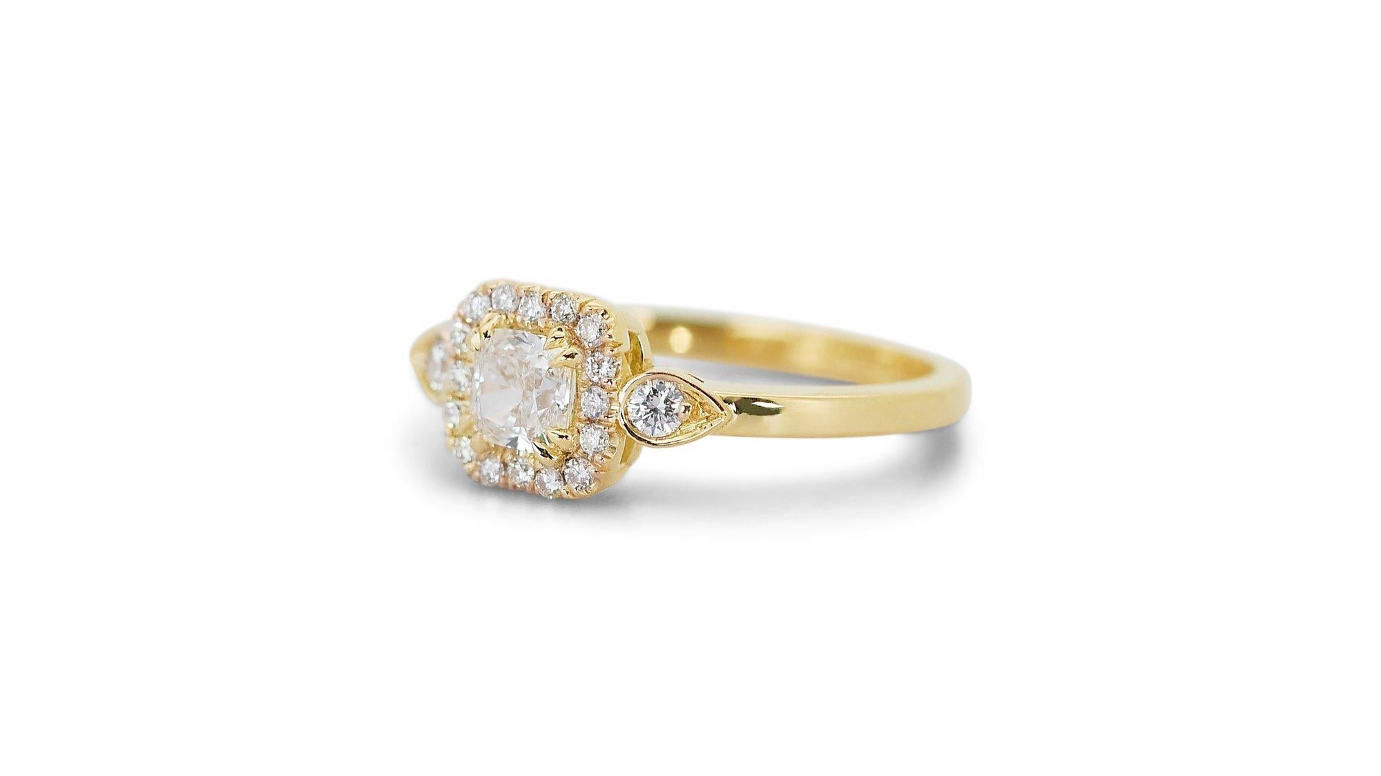 
Lustrous 18K Yellow Gold Halo Natural Diamond Ring w/1.03 ct - GIA Certified

This captivating ring features a stunning 0.72 carat center diamond, meticulously cut in a modified brilliant style to maximize its brilliance. Eighteen dazzling side