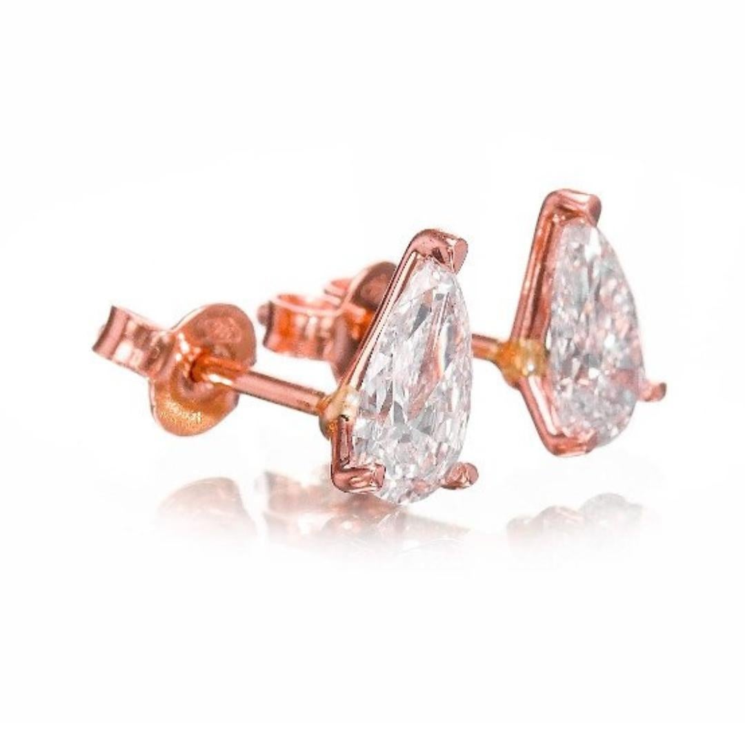 Lustrous 2.03ct Diamond Stud Earrings in 18k Rose Gold - GIA Certified 

Unveil timeless beauty with these diamond stud earrings each featuring a pear-cut diamond meticulously set in luxurious 18k rose gold. These solitaire stud earrings boast an