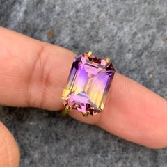 Lustrous 7.70 Carat Emerald Shape Loose Bicolor Ametrine From Bolivia