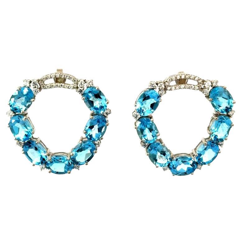 Orecchino a cerchio aperto in argento sterling con topazio blu e zircone, regalo per lei in vendita