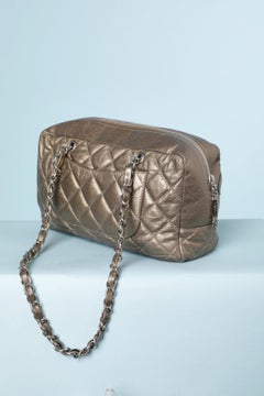 Lustrous bronze caméra leather bag with chain shoulder strap Chanel Numbered