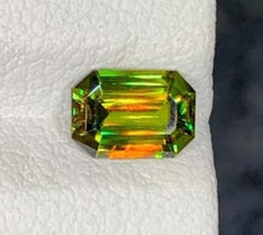 Lustrous Green Chrome Sphene Gemstone Titanite: Emerald Cut 0.67 CT