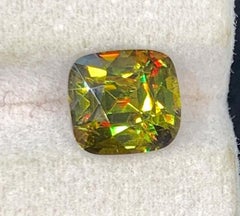 Lustrous Green Sphene Gemstone: Multi Color Cushion Cut, 2.66 Carat
