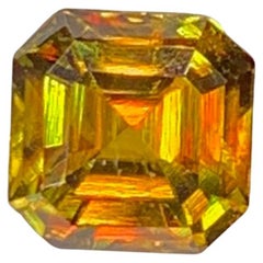 Lustrous Natural Sphene Titanite Gemstone: 0.90 Carat Yellow/Green Asscher Cut