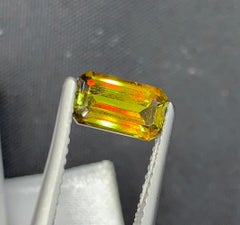 Lustrous Sphene Gemstone: MultiColor Emerald Cut, 1.26 Carat