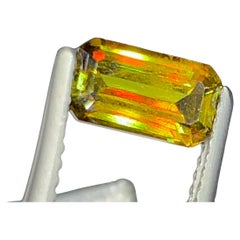 Lustrous Sphene Gemstone: MultiColor Emerald Cut, 1.26 Carat