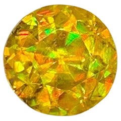 Lustrous Sphene Gemstone: MultiColor Round Cut, 1.40 Carat