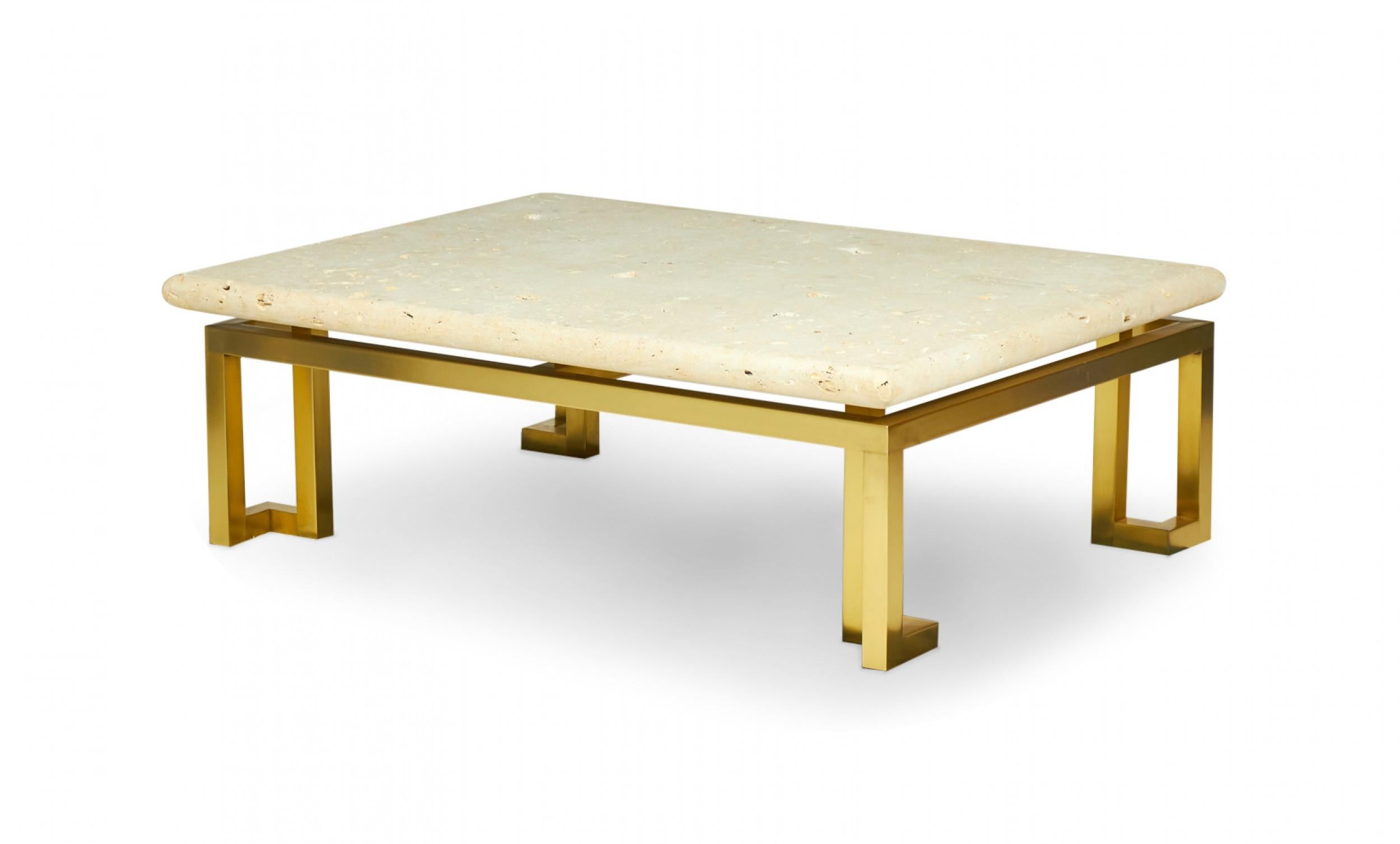 American High Style (circa 1980) rectangular coffee / cocktail table with a natural fossil stone top and a satin brass frame. (Luten, Clary, Stern, INC.)
  