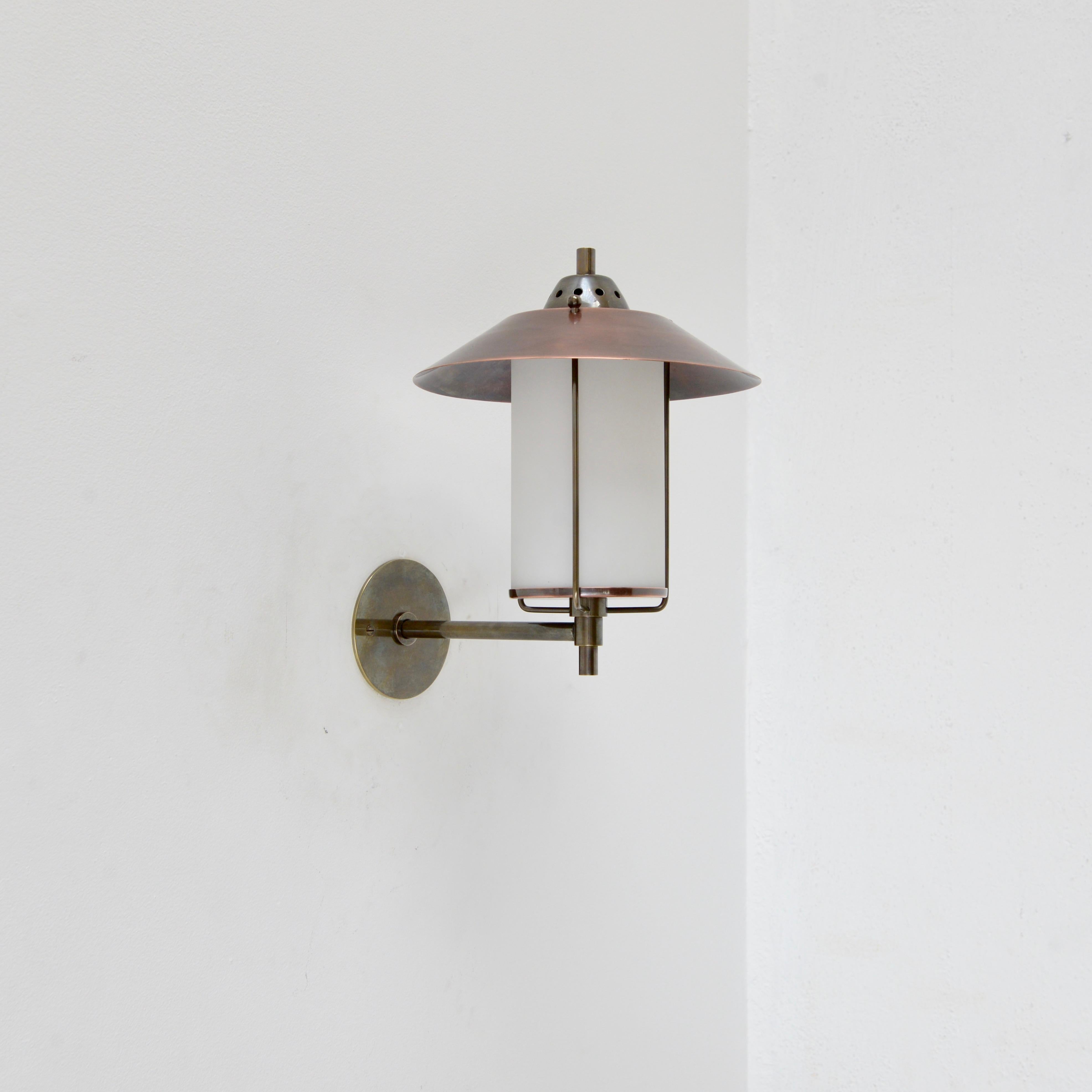 Part of Lumfardo Luminaries contemporary collection, the LUntern Outdoor sconce is a classic Mid-Century Modern design made to order. Crafted from copper, brass and glass, this fixture can be wired for any worldwide standard. Single E26 medium based