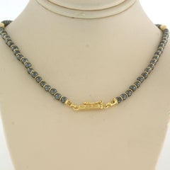 LUTH DESIGN - necklace with hematite, moonstone and diamonds 18k yellow gold