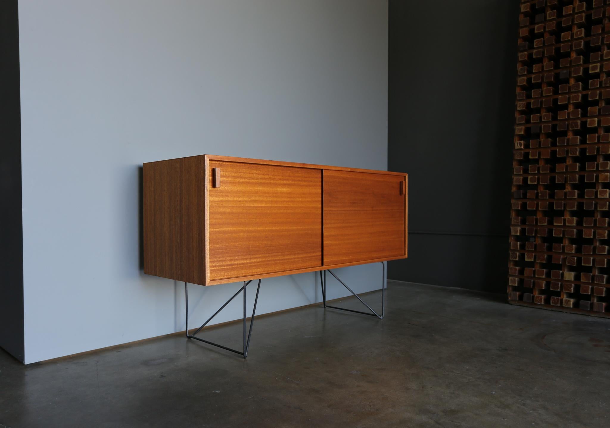 Luther Conover credenza. This design is part of the Pacifica Line for Muriel Colemans company California Contemporary. circa 1950.