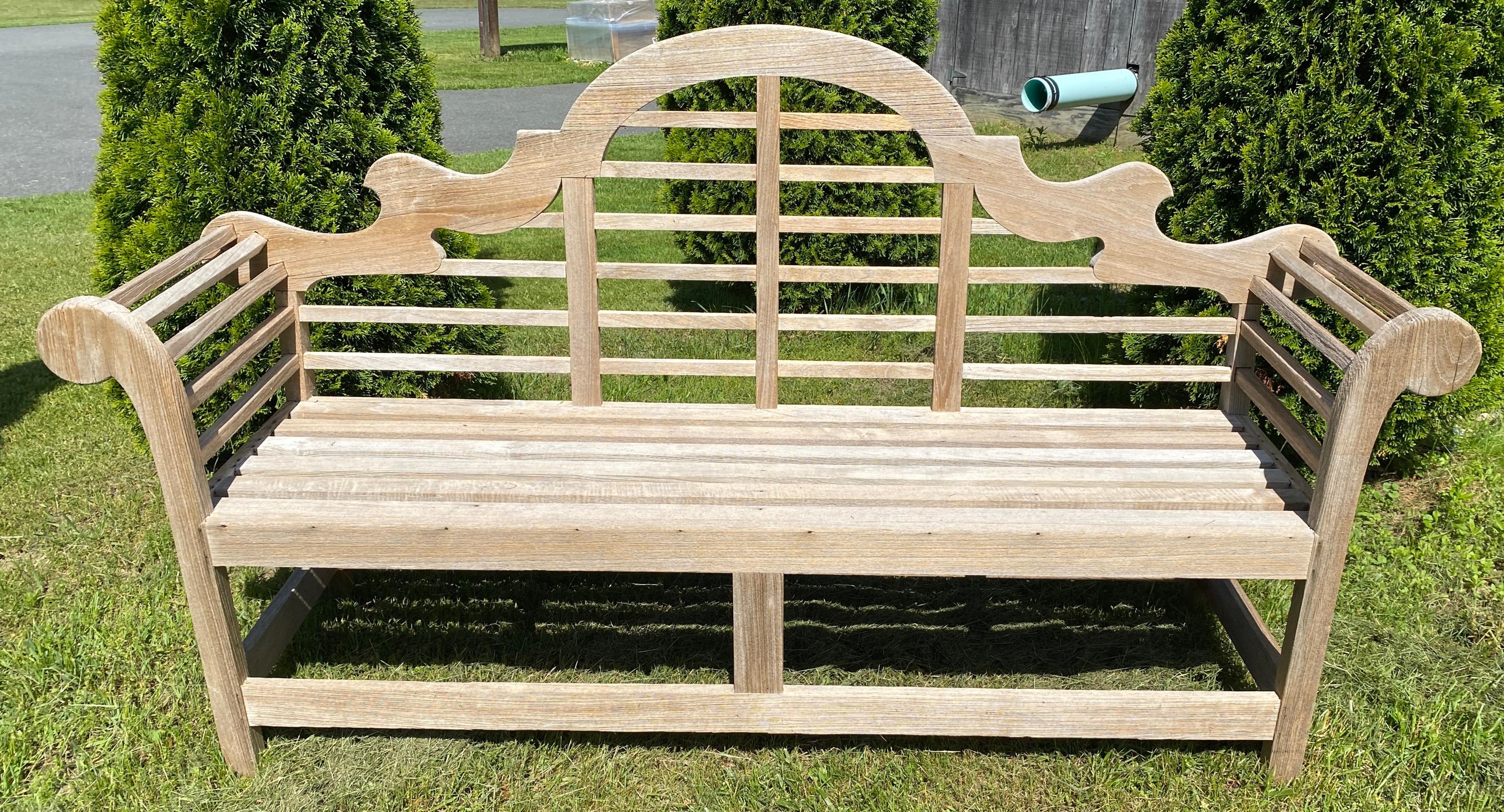 A fine vintage Lutyens style English garden bench, featuring a high-arched back for comfort and graceful rolled arms - an overall look of elegance for outdoor or indoor garden, garden room, or patio. This bench has been newly cleaned, leave it out