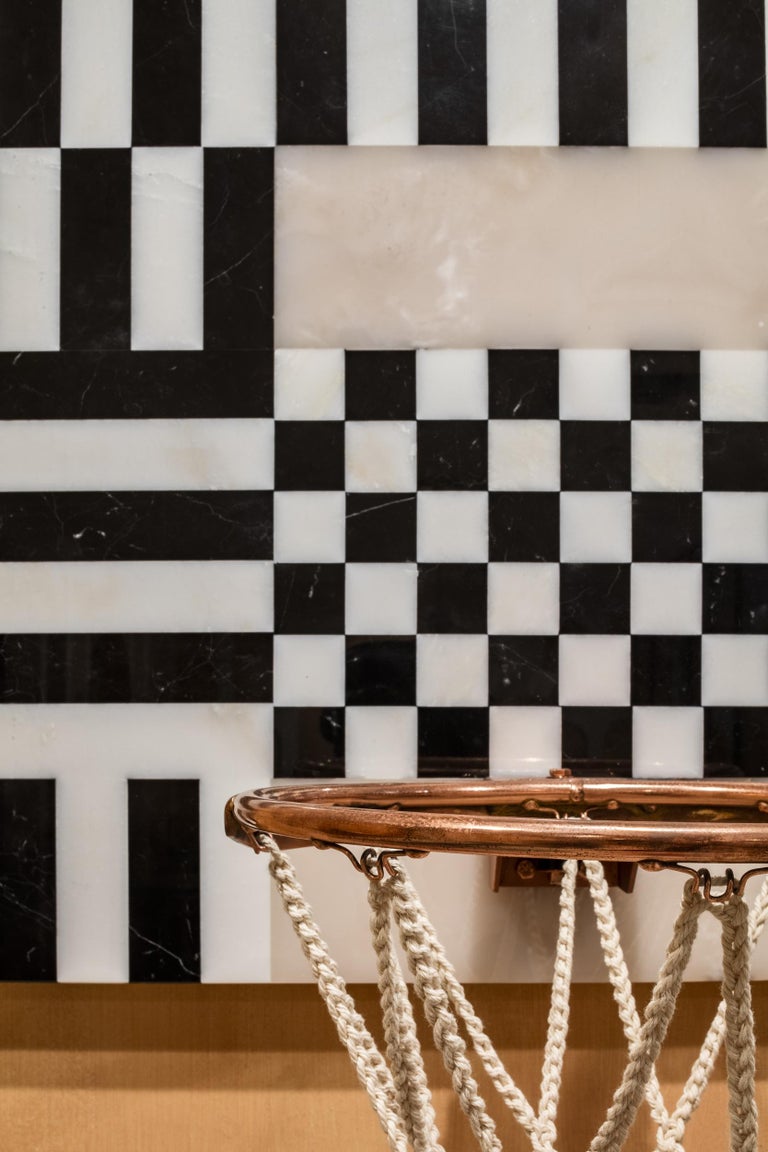 These wall-mounted basketball hoops combine marble, onyx, copper and hand-woven cotton thread to pay homage to the ancient elements of their inspiration. Available with a square or arched ‘backboard’, these sophisticated hoops can be used to