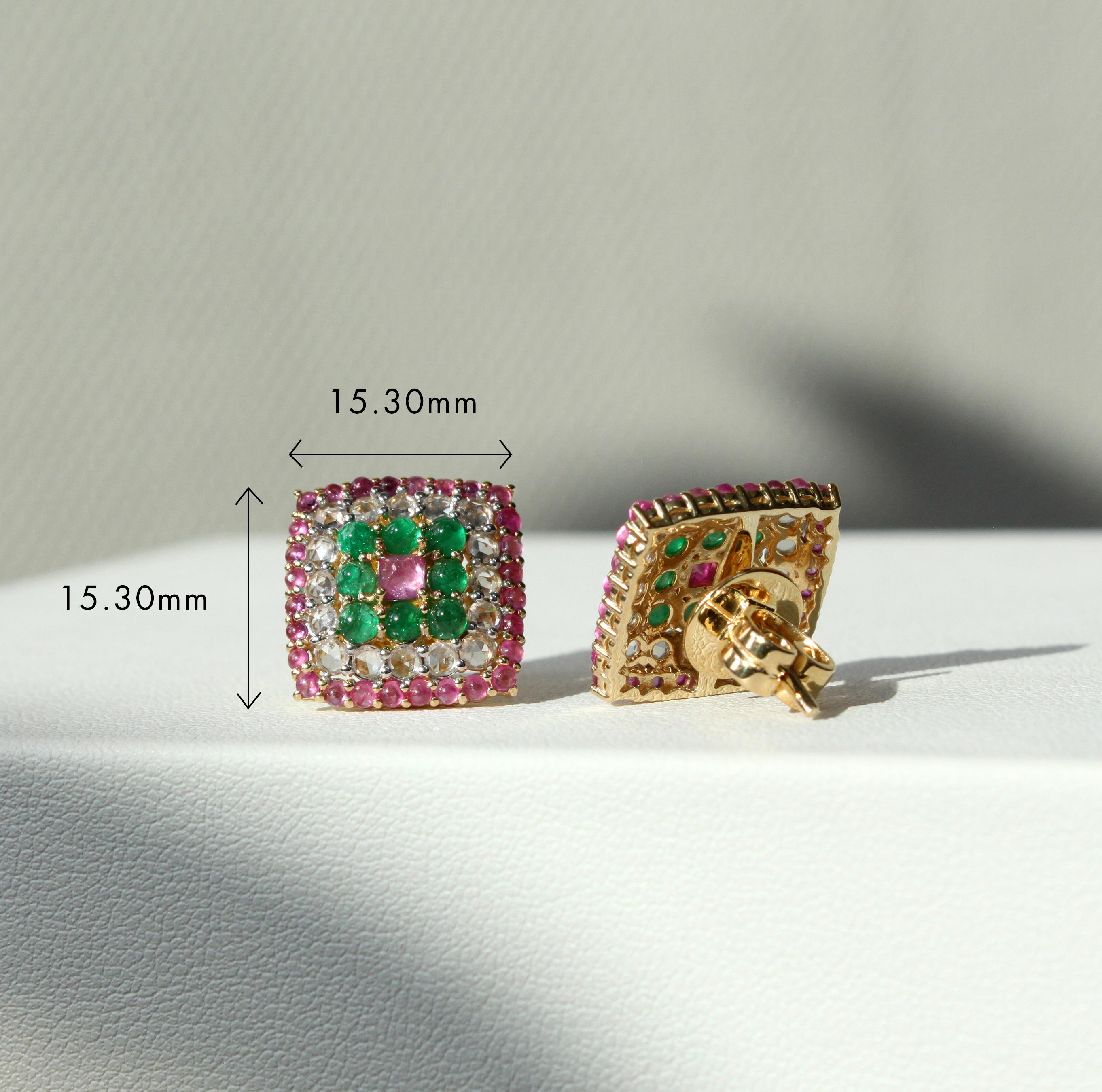 14K white gold
1.22ct emerald 
1.82ct ruby
1.46ct white sapphires 
Total earring weight7.61 g

These captivating earrings offer a stunning display of color, set in luxurious 14K white gold. In the center is a mesmerizing pink sapphire cabochon, its