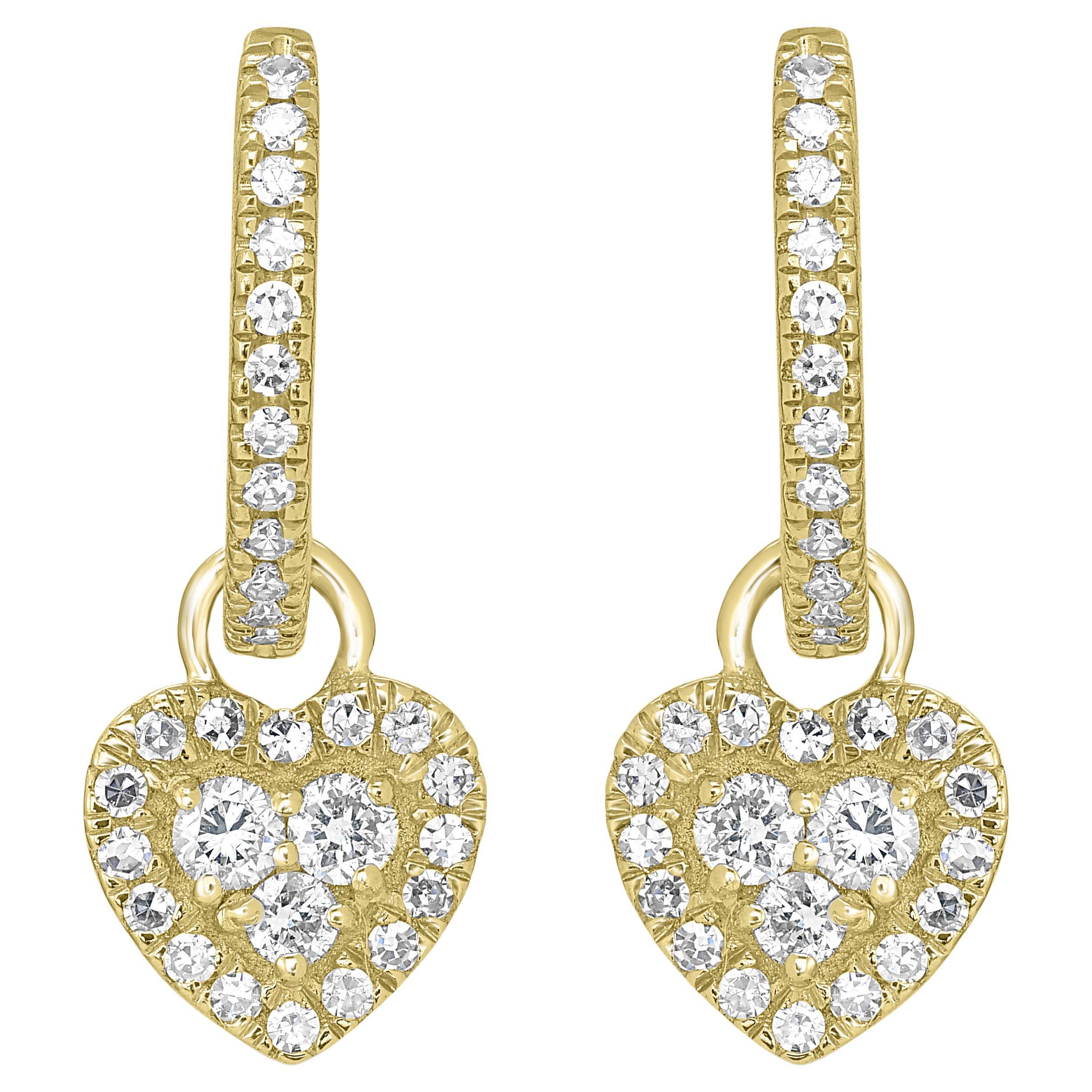 Make a beautiful statement with these Luxle heart hoop drop earrings made of 14k yellow gold and genuine diamonds. The epitome of the heart motif is a piece that is set with diamonds. These lobe-hugging earrings feature a charming heart drop that