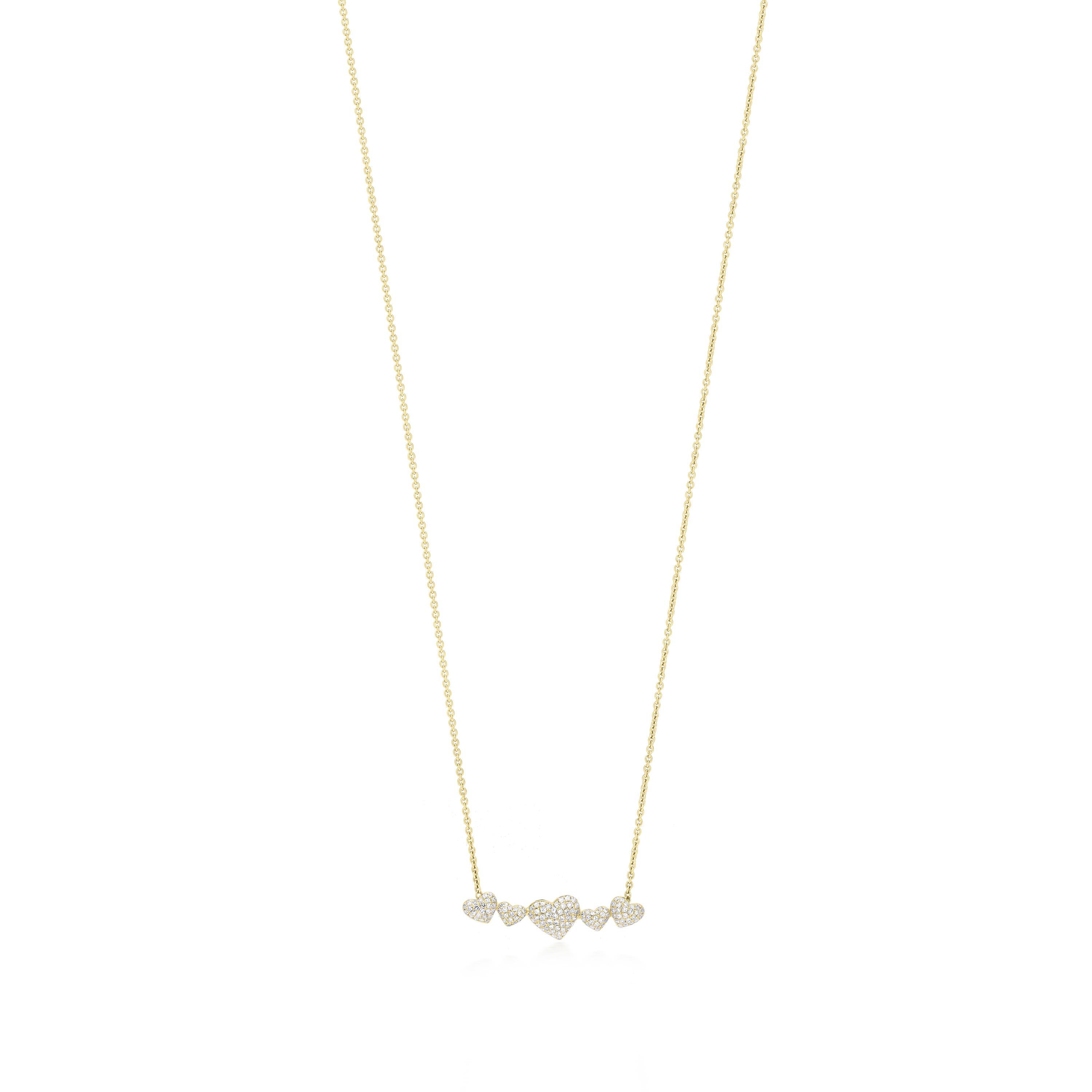 This pendent necklace from the Luxle features a series of hearts, each adorned with diamonds. The necklace showcases a large central heart, flanked by two smaller hearts on each side, all designed and set with shimmering round diamonds, with a color