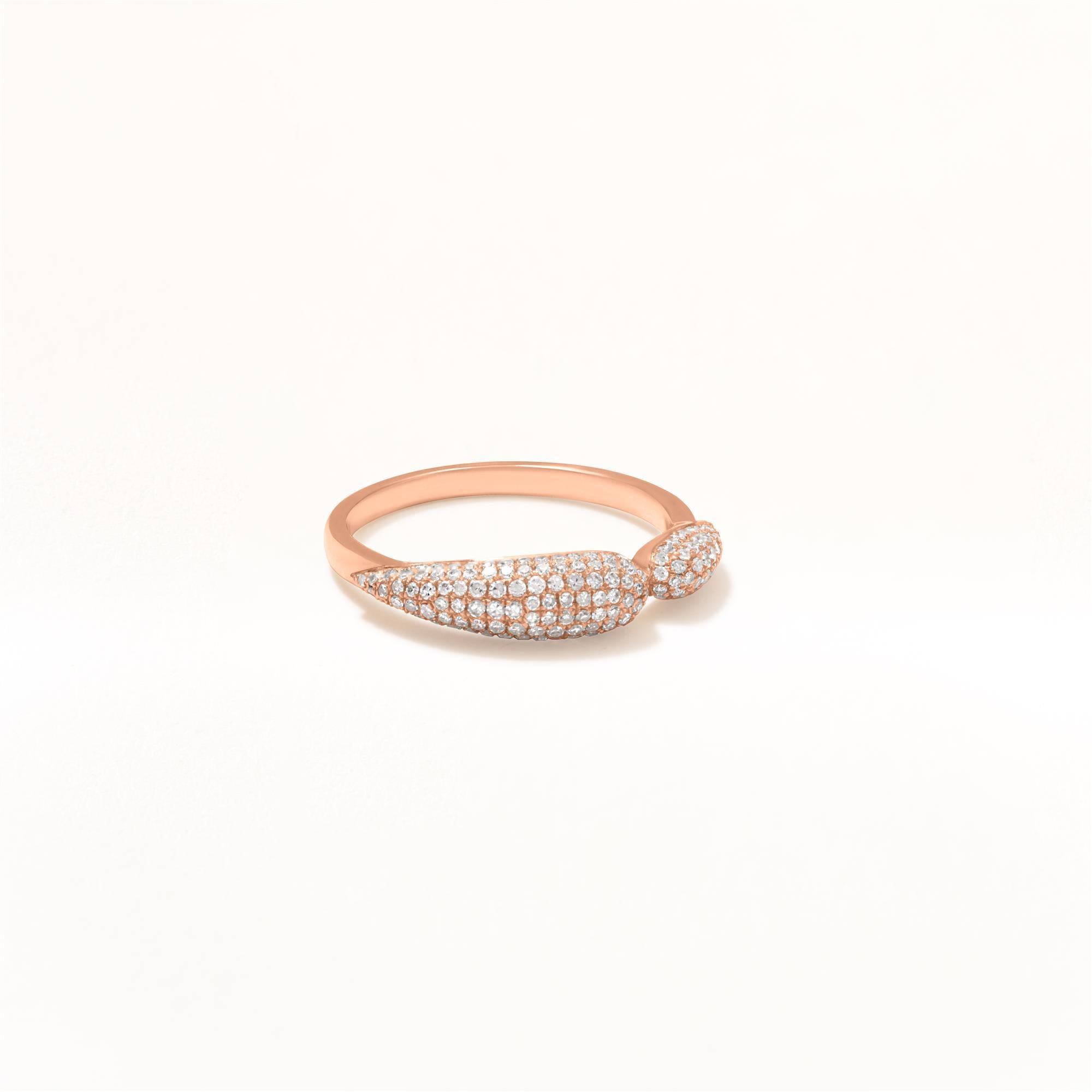 This unique 18K rose gold ring features a captivating design, inspired by nature with a top that resembles a  bamboo leaf. Adorned with sparkling diamonds set in a  pave setting, the ring's bold and modern aesthetic, combined with the shimmering