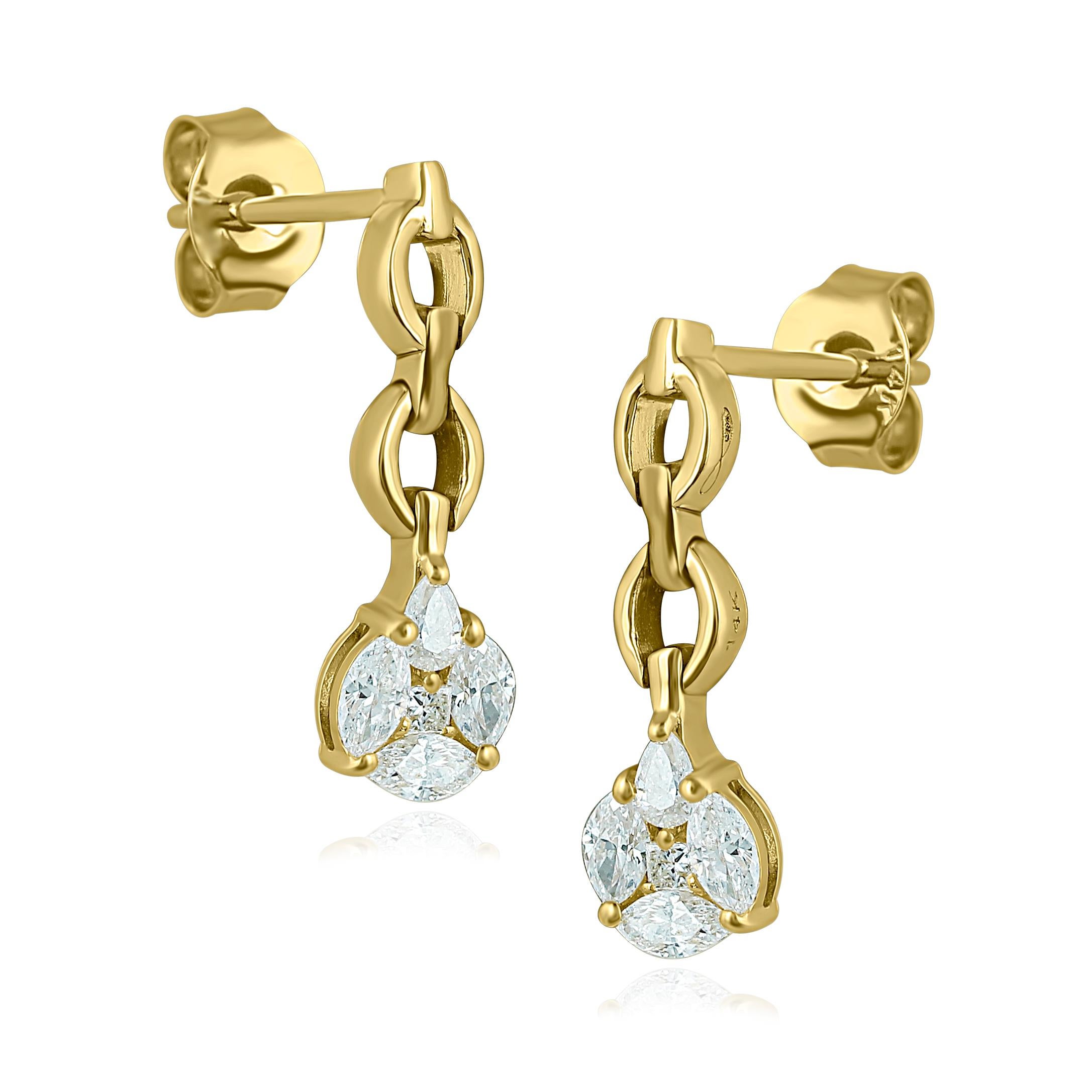 Alliant modernité et élégance intemporelle, ces remarquables boucles d'oreilles pendantes en or 14 carats à diamants en forme de poire présentent un saut de chaîne qui rejoint la grappe harmonique de diamants : un trio de formes distinctes - au