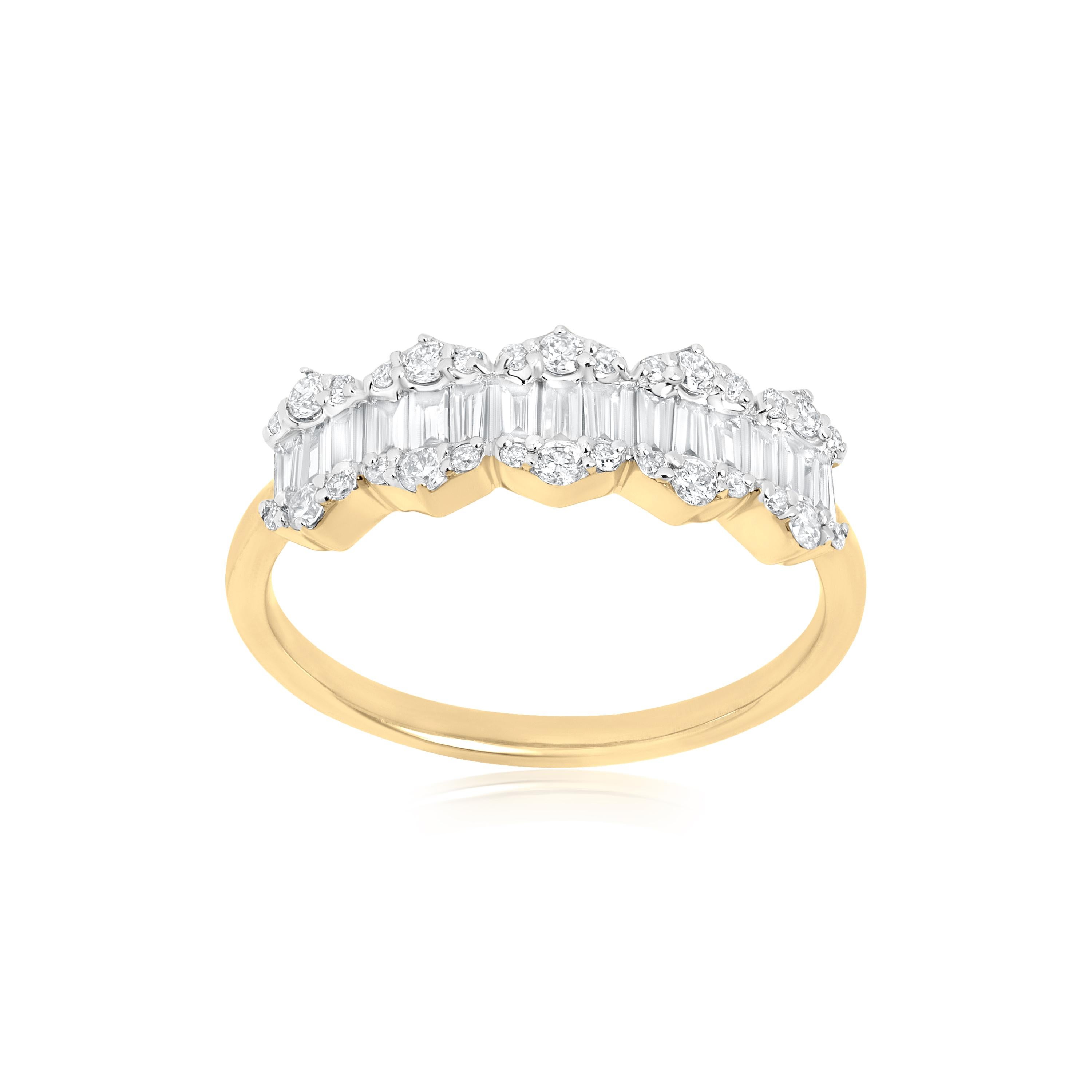 This elegant baguette diamond ring features a sophisticated blend of modern design and timeless appeal. The ring showcases a row of five baguette-cut diamonds, each beautifully set in a hexagonal-shaped setting that adds a sleek, geometric flair. On